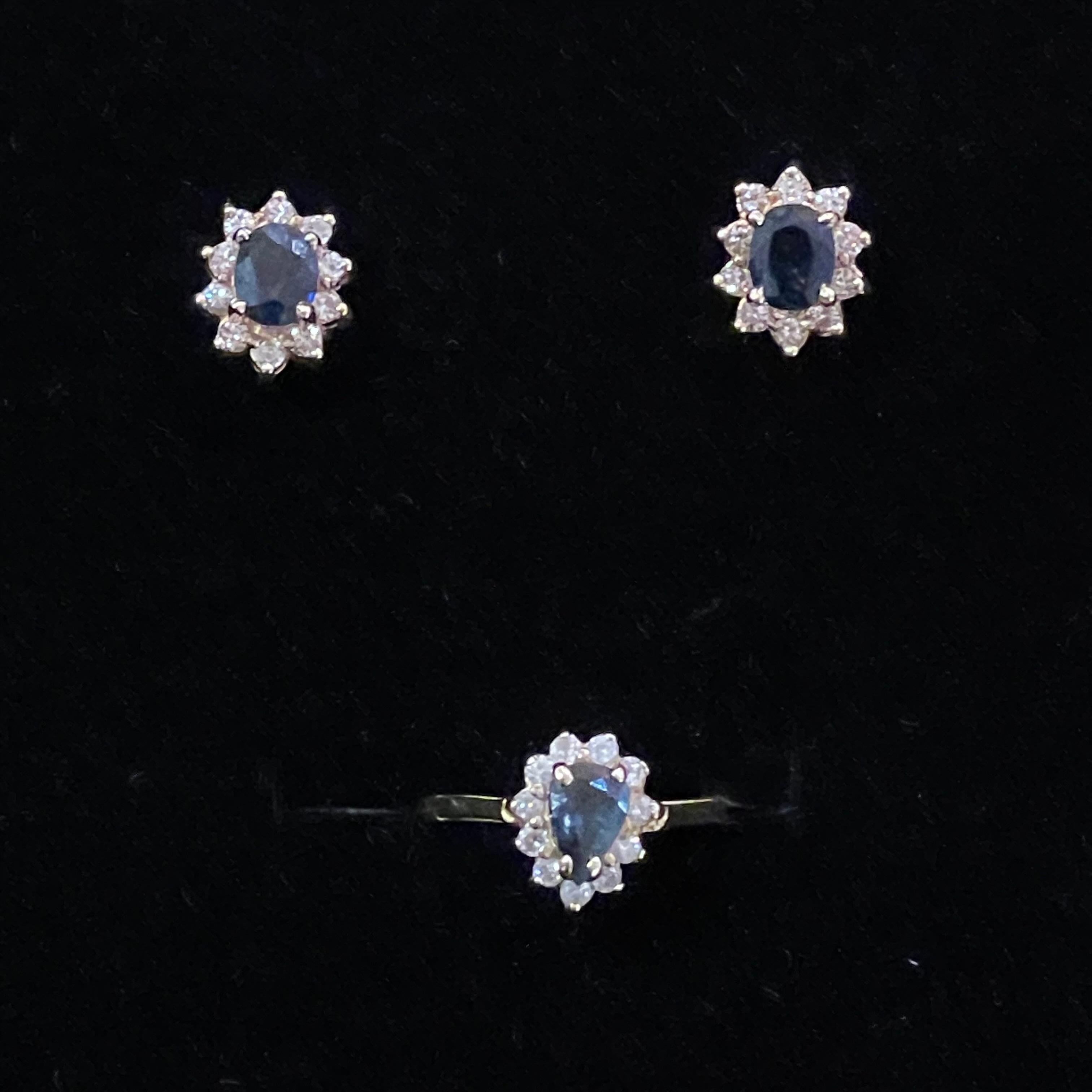 Set of a Sapphire Ring and Pair Earrings, 14k Gold, Diamond

Ring size: 5
Total weight: 5 grams
Ring: 2 grams
Earrings: 3 grams