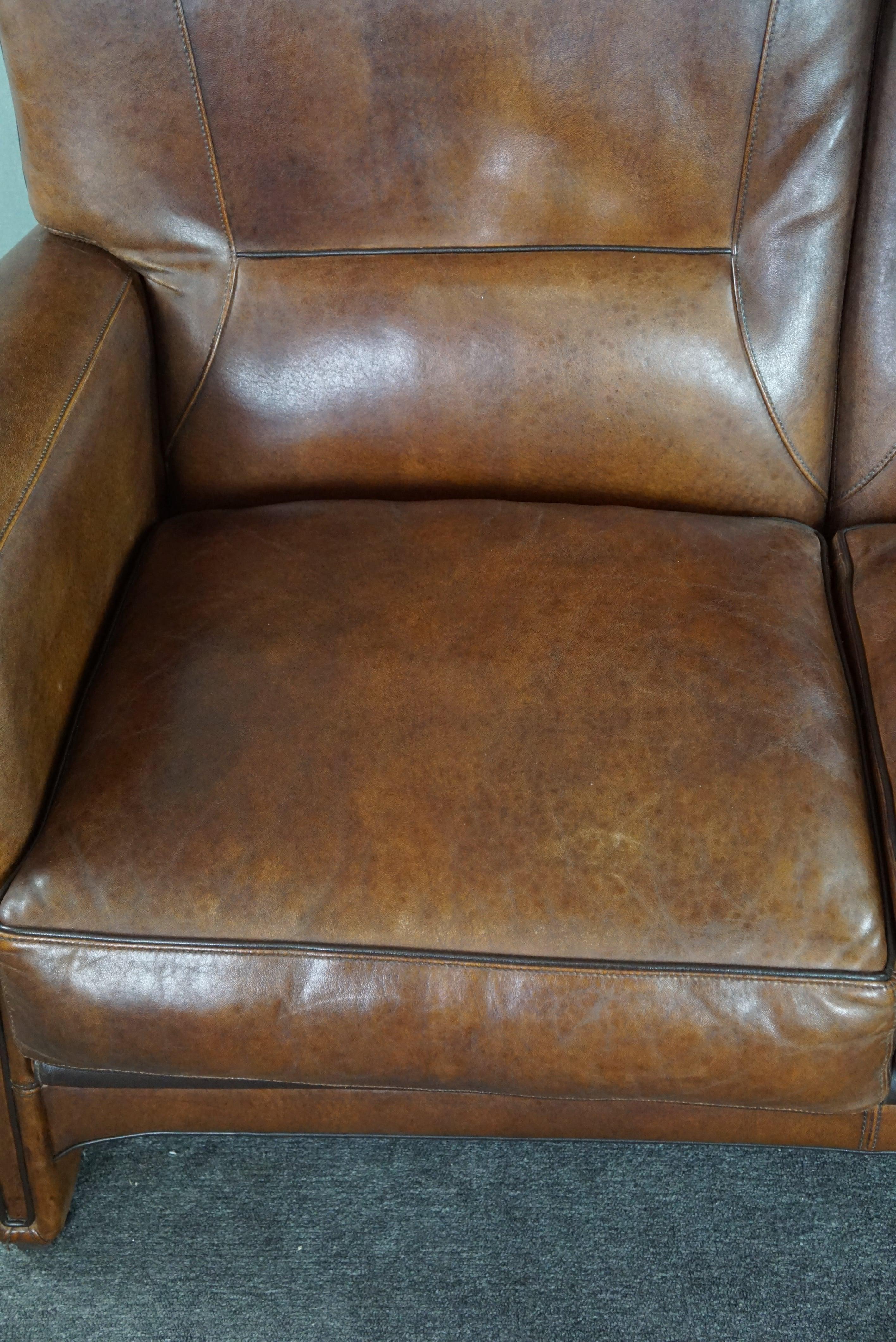 Set of a sheep leather design sofa and armchair For Sale 1