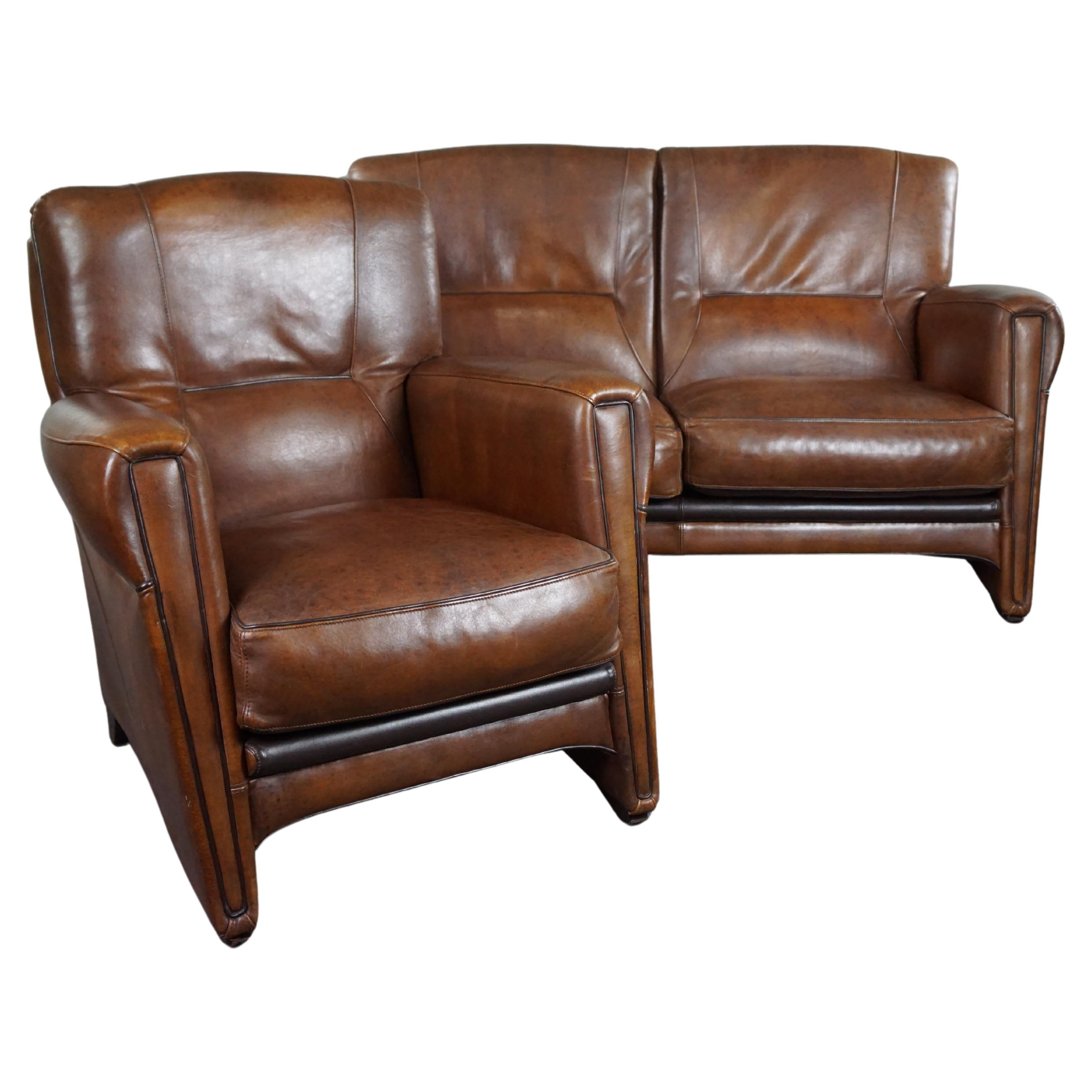 Set of a sheep leather design sofa and armchair For Sale