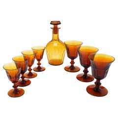 Set of amber glass stemware with decanter attributed to Phineas Dummer, c. 1830