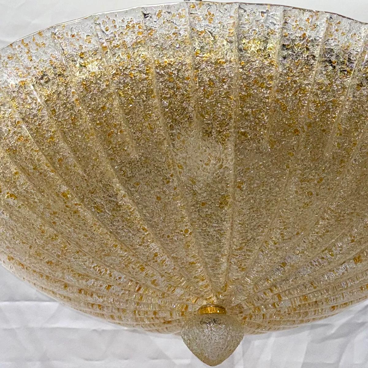 Milieu du XXe siècle Ensemble de luminaires en verre de Murano ambré, vendus individuellement en vente
