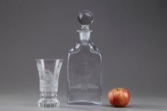 Set of an Engraved Glass Carafe and a Crystal Glass