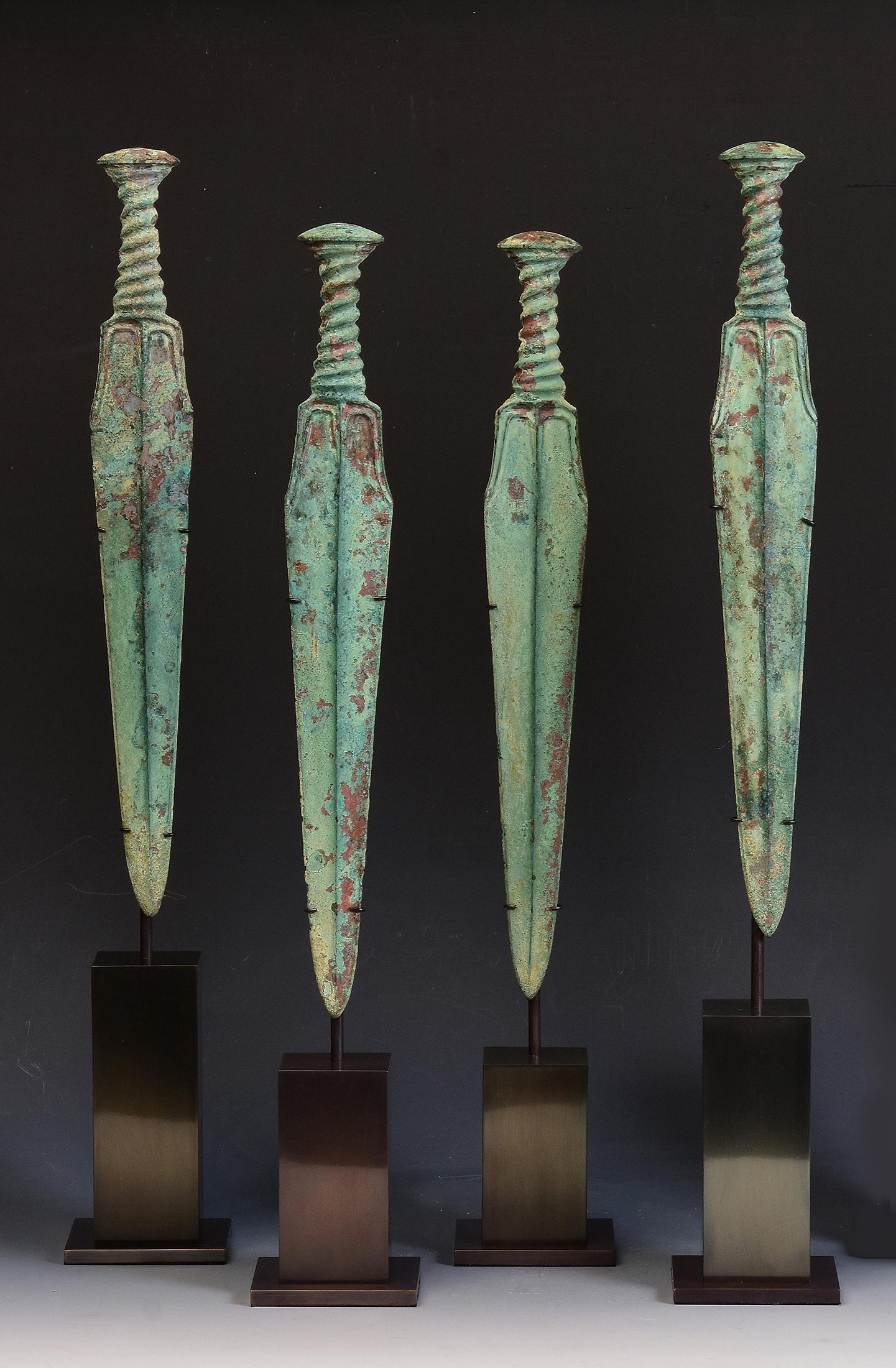 A set of ancient Luristan bronze swords with excellent green patina.

Luristan bronze comes from the province of Lorestan, a region of nowadays Western Iran in the Zagros Mountains. With its rich and long history, Luristan culture is well-known