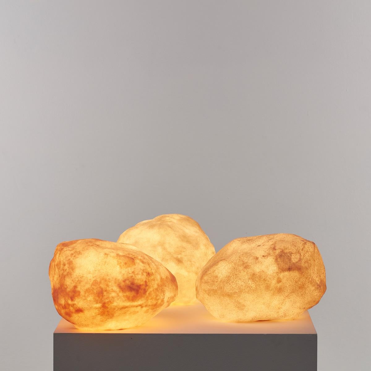 These table lamps in the form of rocks are made from textured fibreglass. The design is attributed to André Cazenave (1928-2003) who is best known for his sculptural designs that use nature as their main source of inspiration, for instance