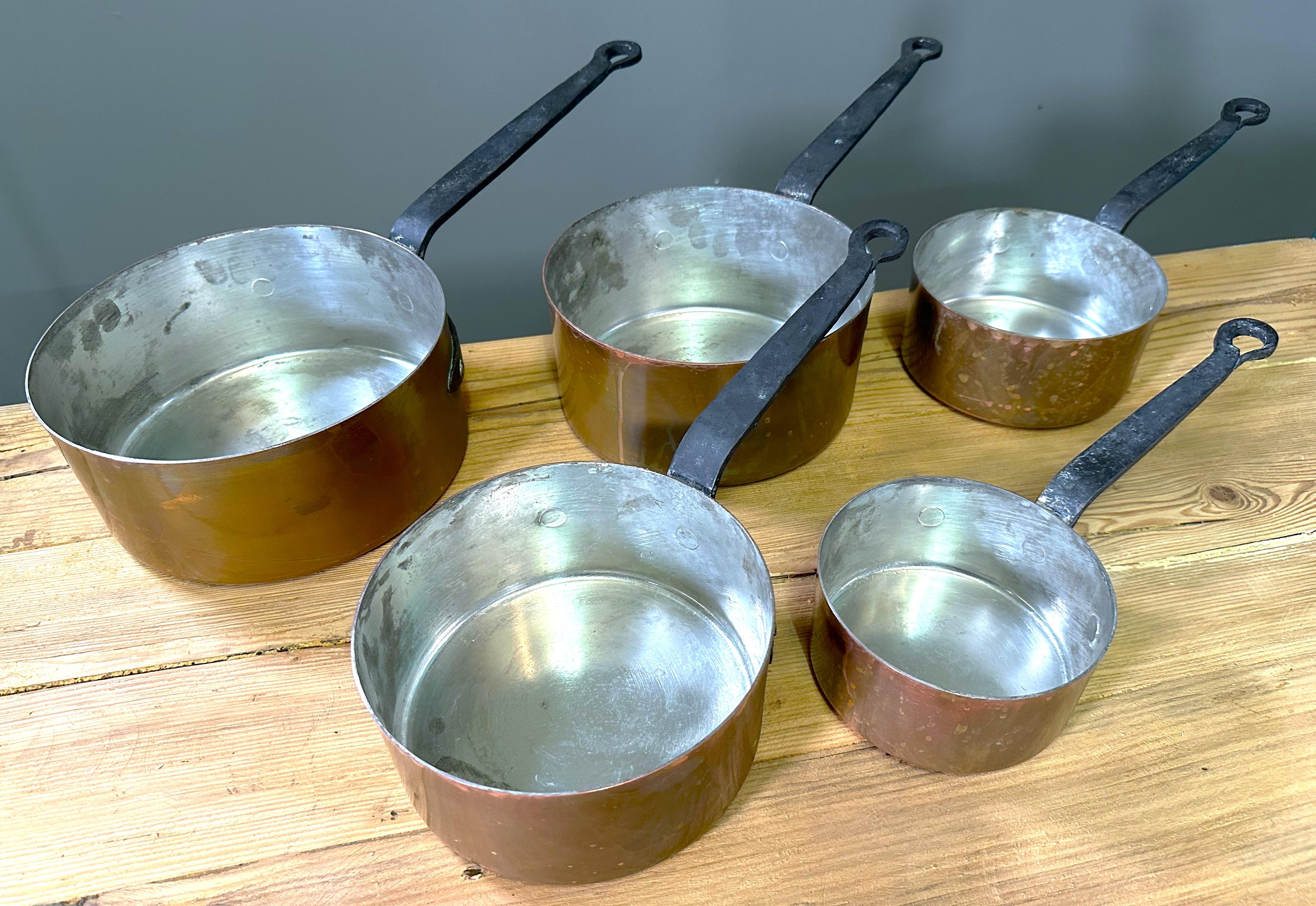 Early 20th Century Set of Antique Cooking Pots Copper and cast Iron Handels, France 1900 For Sale