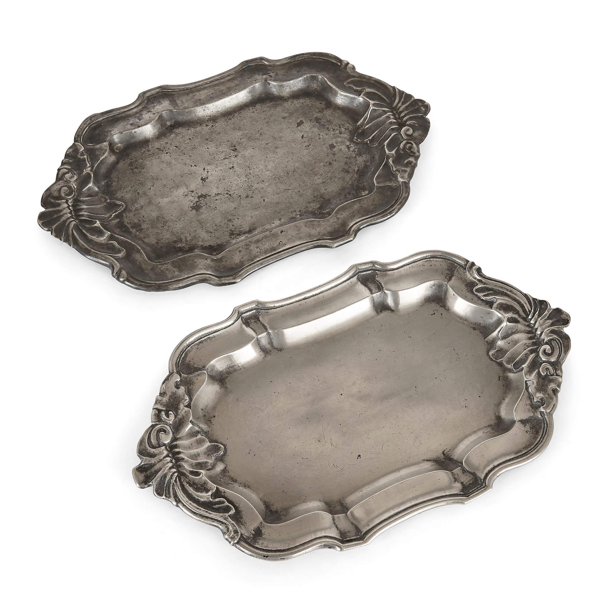 Set of antique German pewter plates
German, 19th Century
Largest plate: Height 4cm, diameter 37cm
Smallest bowl: Height 3cm, diameter 16cm

This eclectic collection of plates is a fine example of late 18th and early 19th century German design.