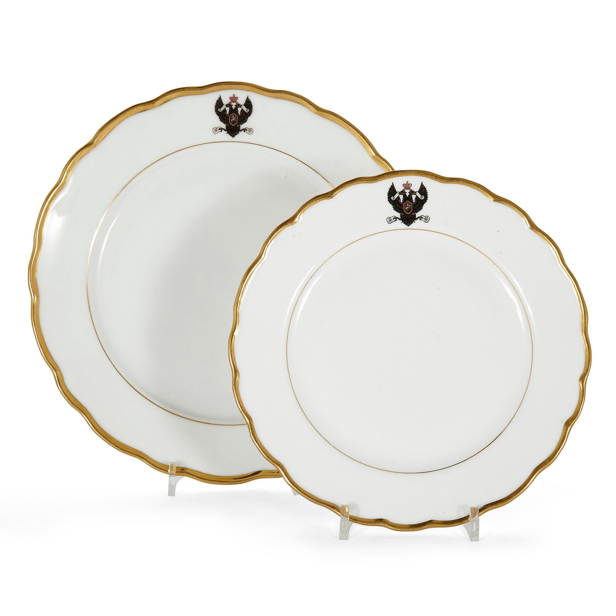 Set of antique Kornilov Porcelain Imperial Russian Navy plates
Russian, late 19th century
Large plates: Height 2.5cm, diameter 24.5cm
Small plates: Height 2cm, diameter 21cm

Consisting of eight plates - four large and four small - this