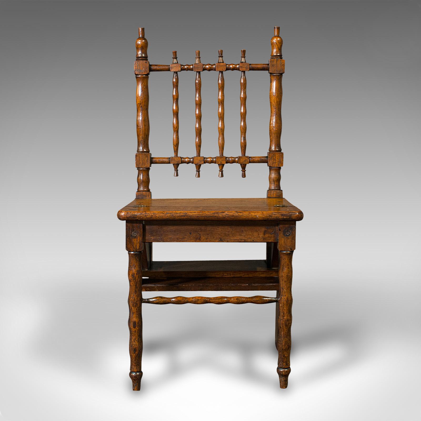 This is a set of antique metamorphic library steps. An English, oak folding chair, dating to the late Georgian period, circa 1820.

Fascinate guests with this attractive example of meubles à surprises - or surprise furniture
Displays a desirable