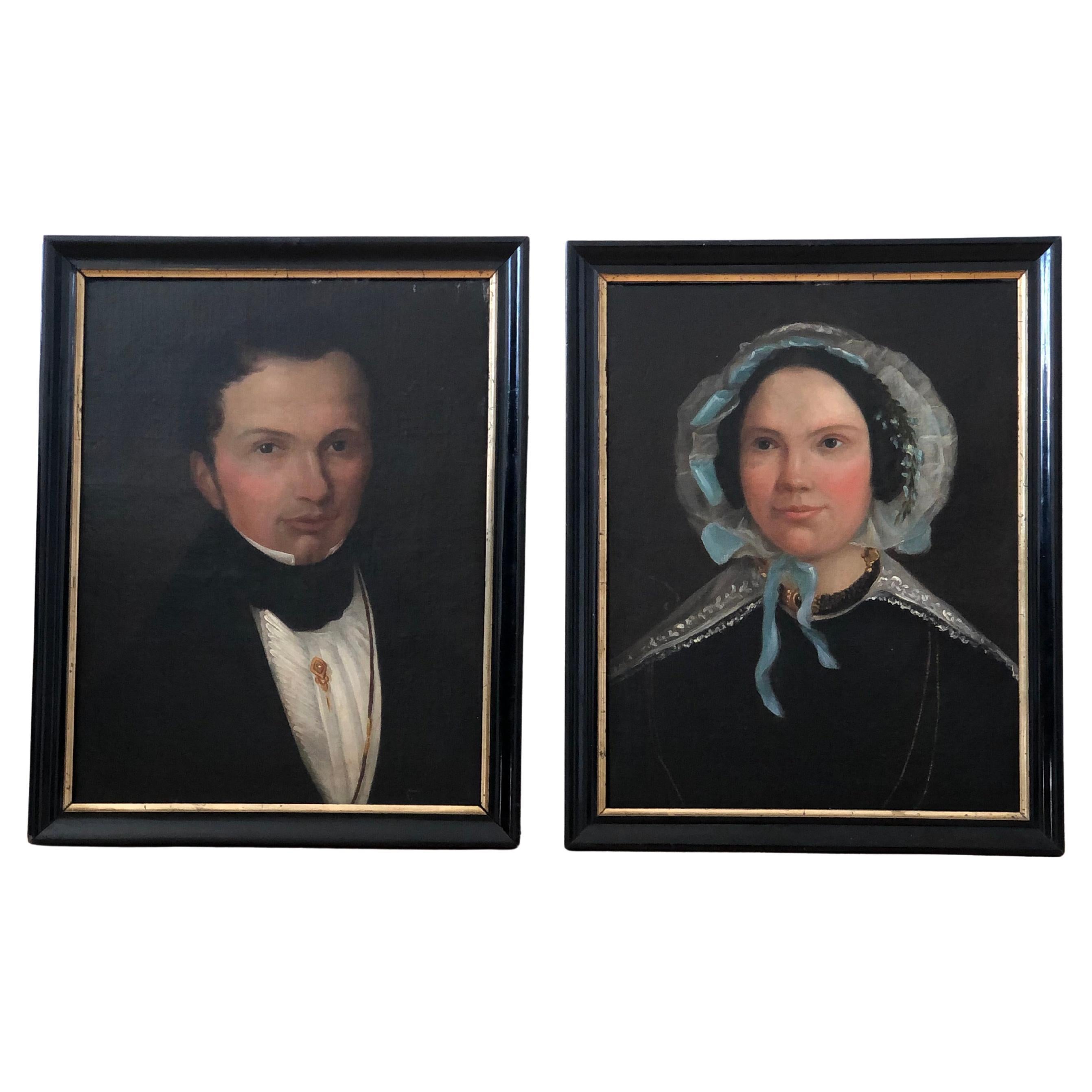 Conjunto de retratos antiguos de una pareja de élite holandesa