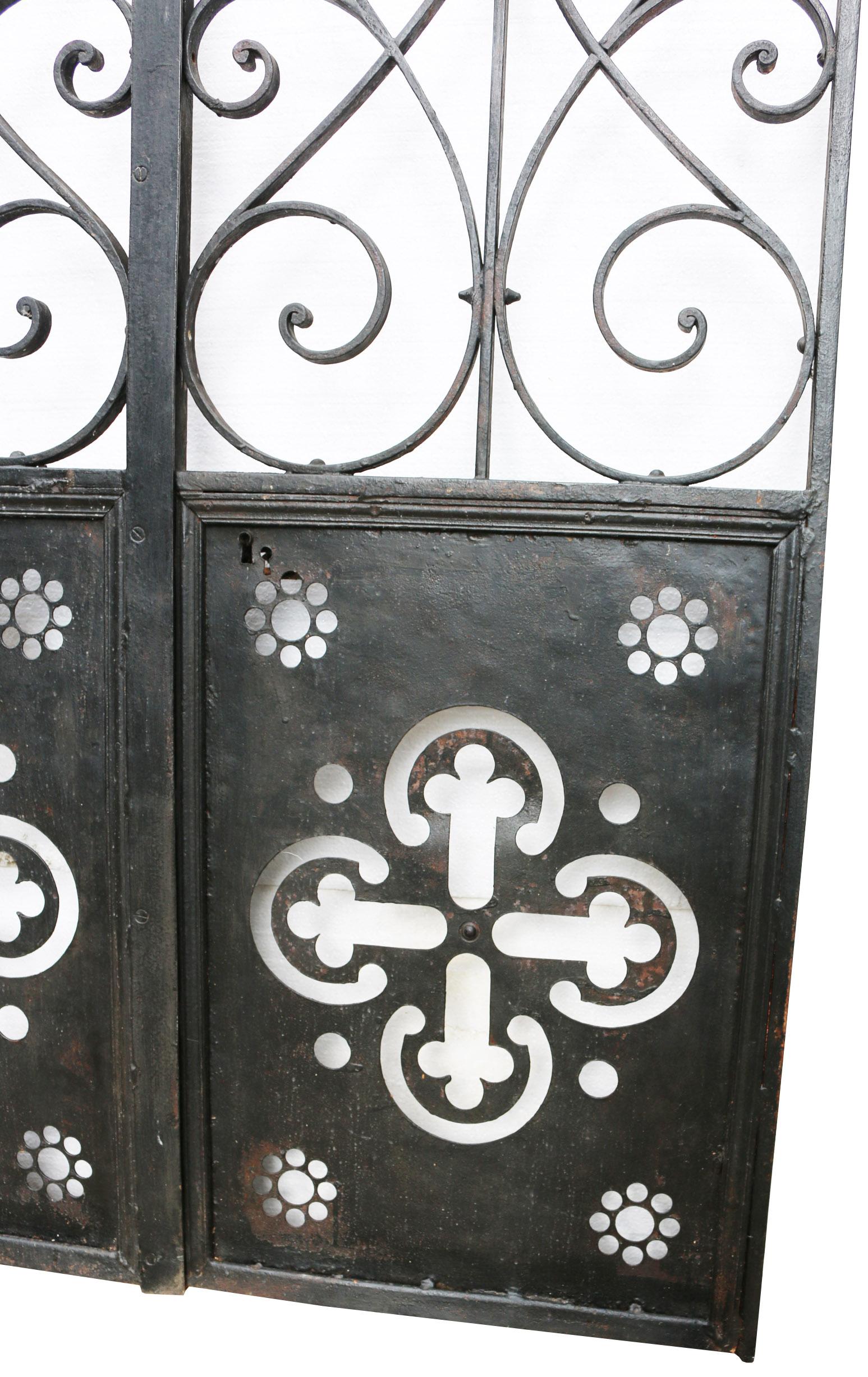 This pair of gates are fitted with glazed panels. These can be removed if required. These were previously fitted as exterior doors on a French Chateau.