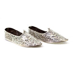 Set of Arabic slippers with camels and plant reliefs