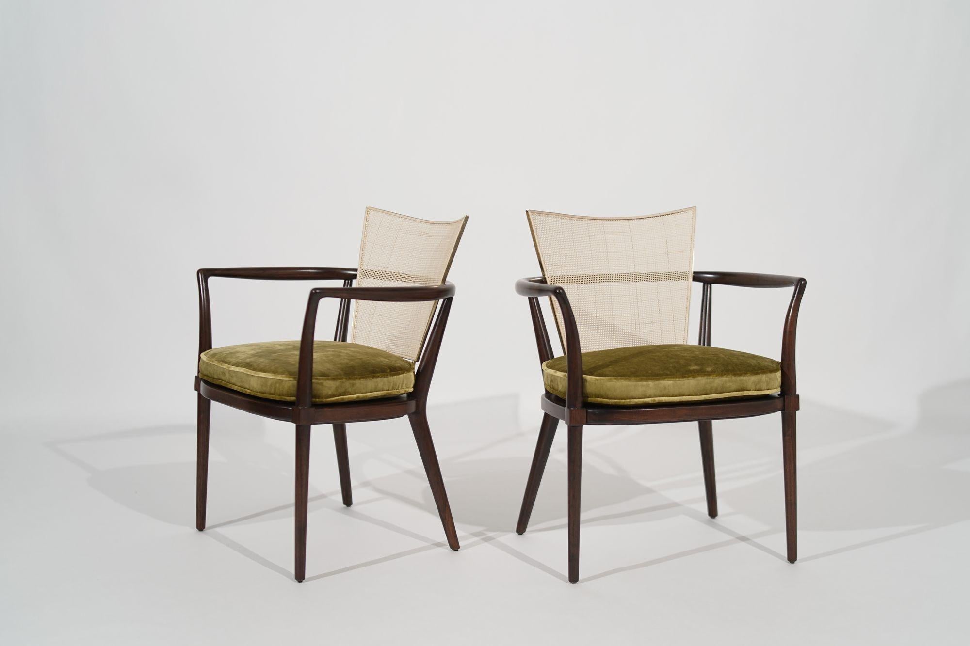 1950s Chairs by Bert England, meticulously revived by Stamford Modern to embody the iconic mid-century style. Crafted from rich walnut with caned backrests and brass accents, these chairs seamlessly blend vintage allure with contemporary