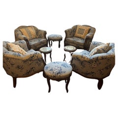 Antique set of armchairs with small tables