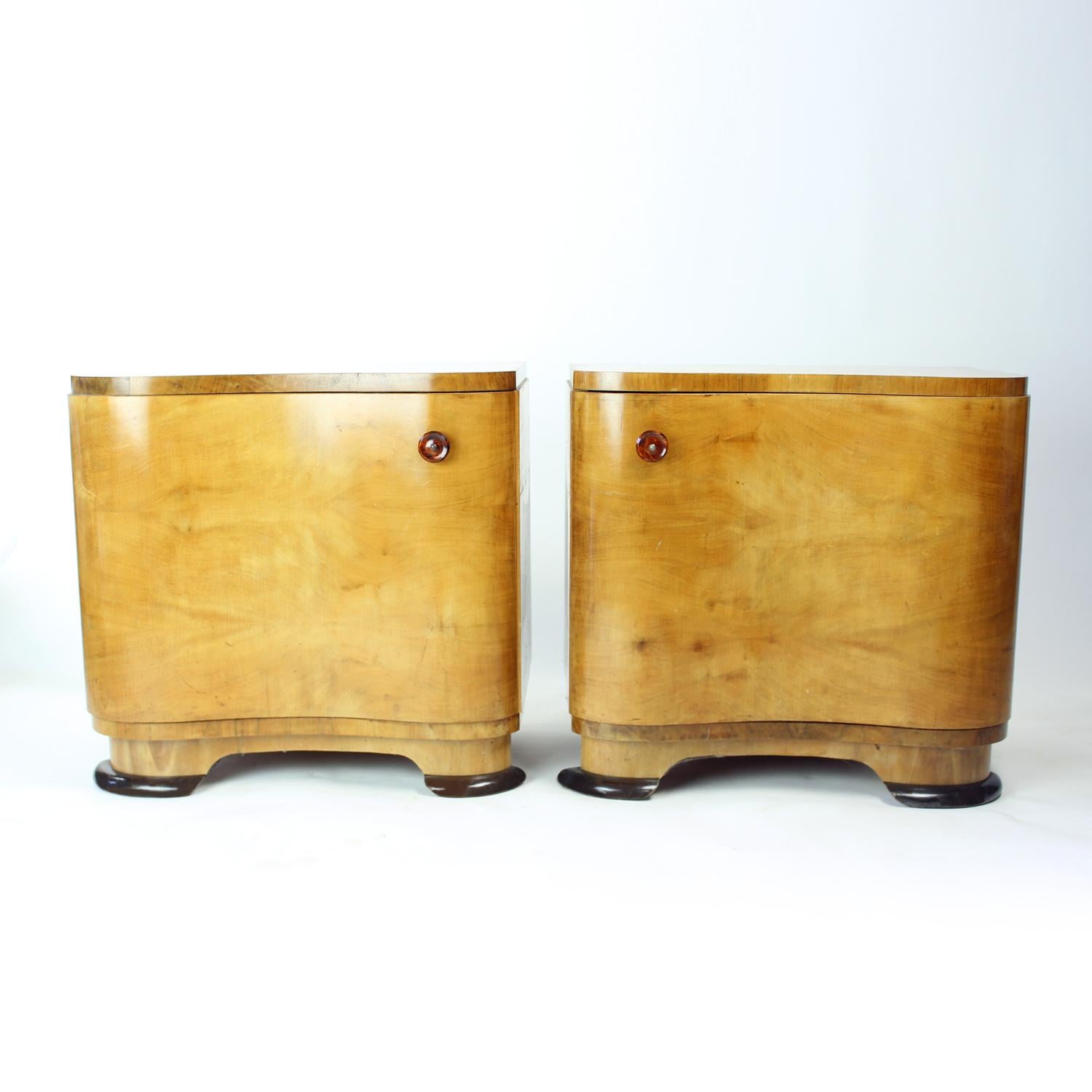 This exquisite pair of Art Deco bedside tables was crafted in Czechoslovakia and remains in rare, outstanding original condition — a true find for collectors and lovers of 20th-century design.
Made from solid oak wood and finished with a rich walnut