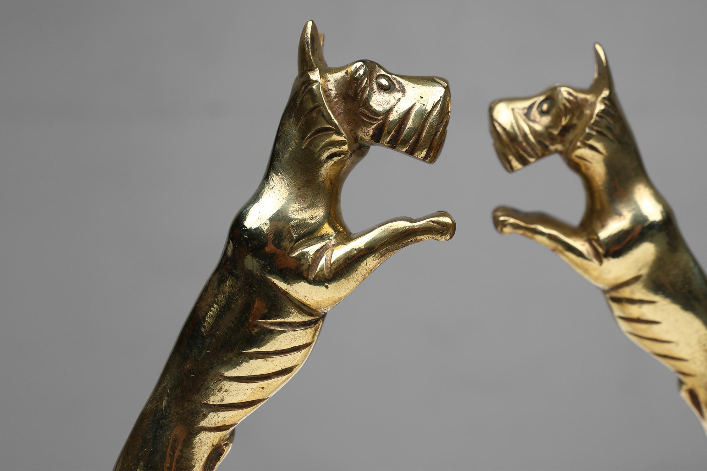 French Set of Art Deco bookends in copper with marble base, France 1930s For Sale