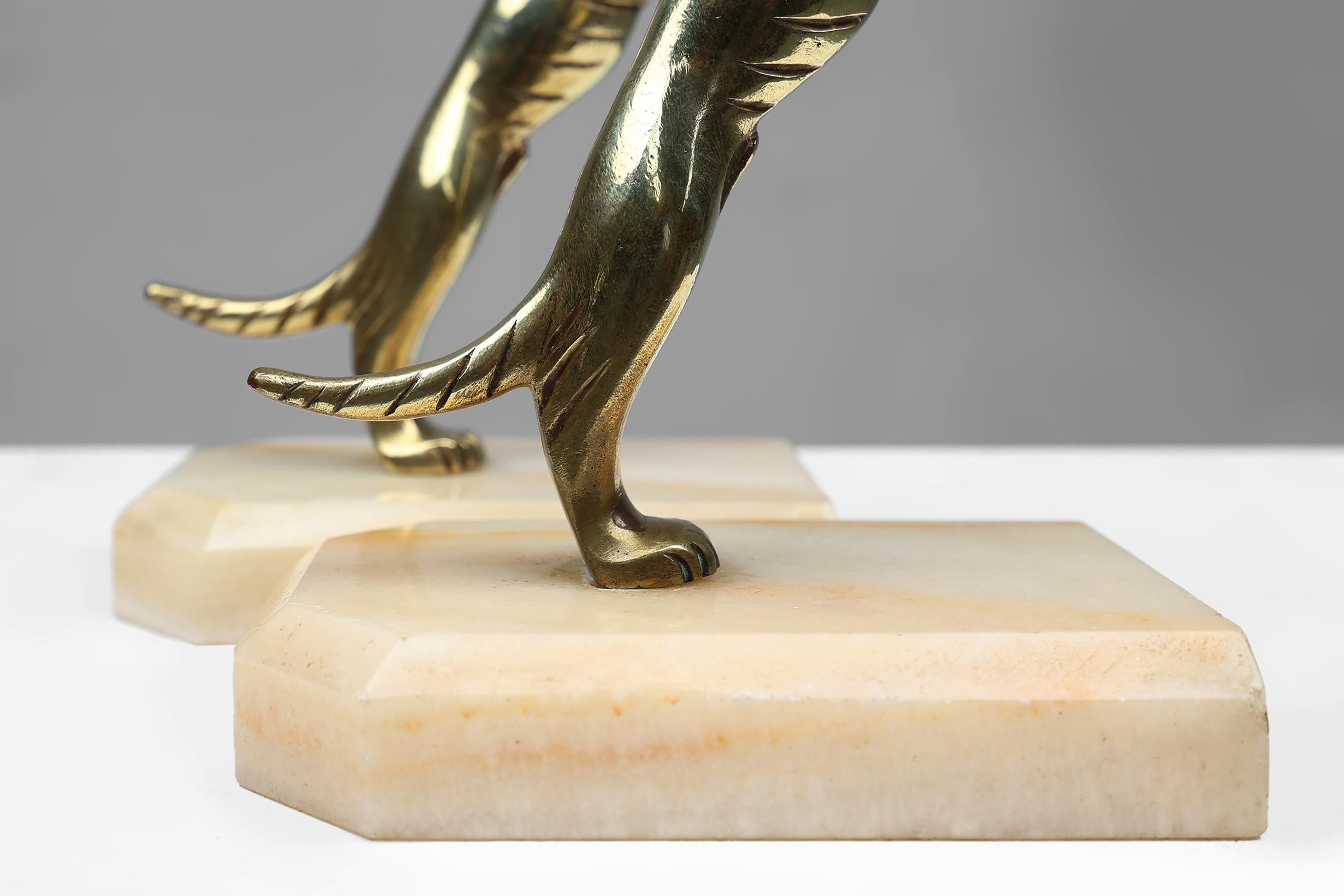 Mid-20th Century Set of Art Deco bookends in copper with marble base, France 1930s For Sale