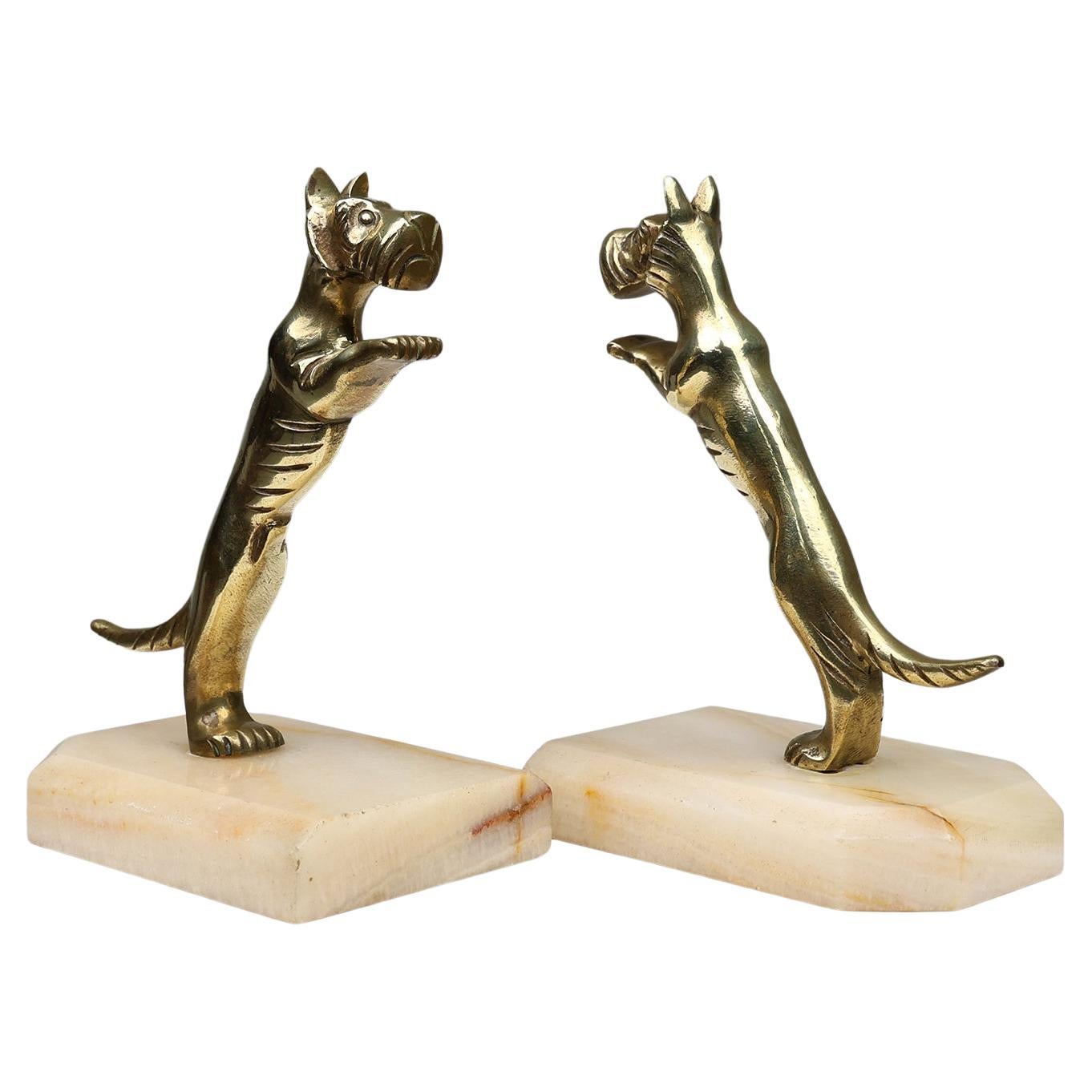 Set of Art Deco bookends in copper with marble base, France 1930s