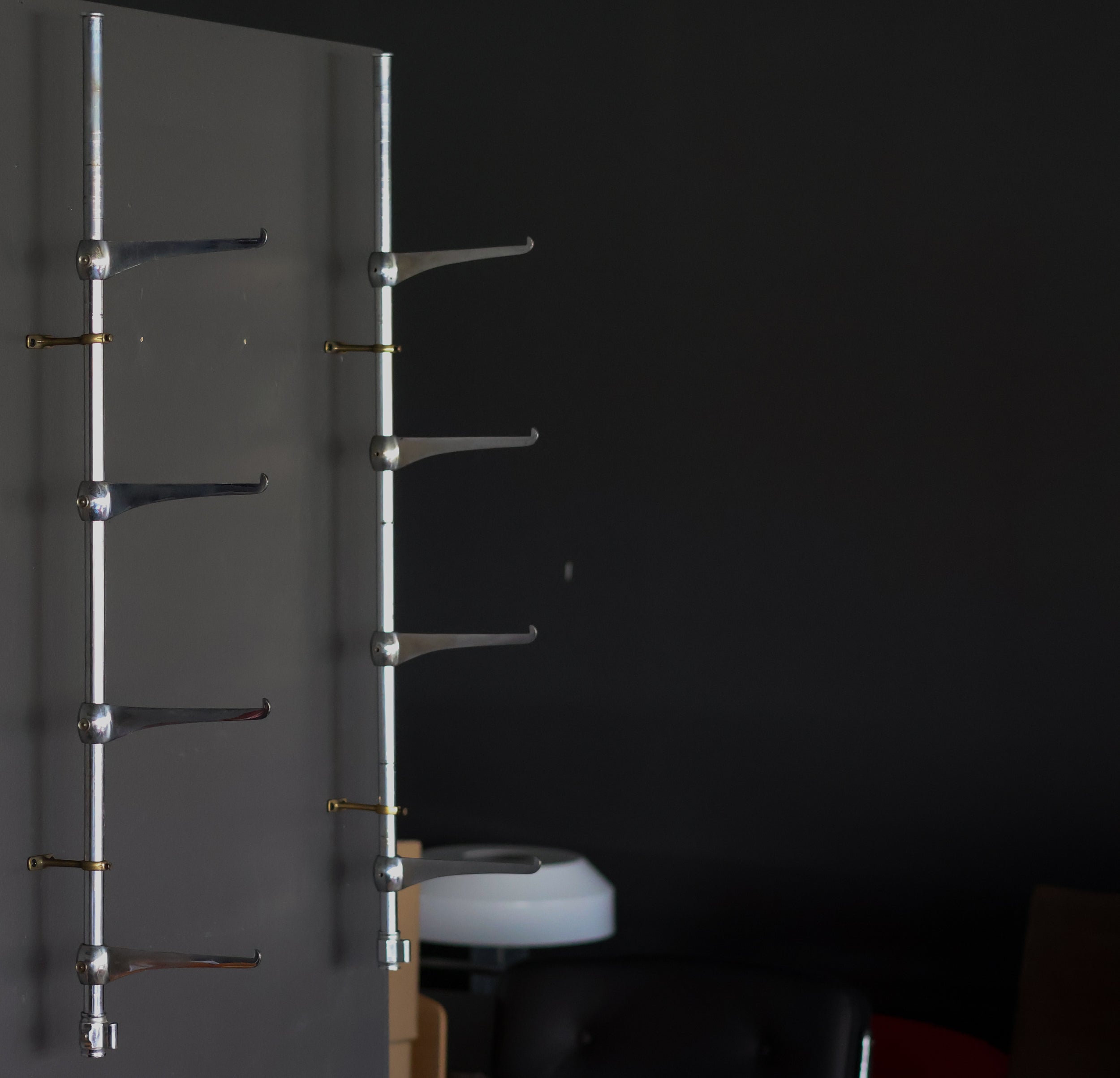 This rare set of Art Deco brackets exemplifies the sleek geometry and craftsmanship of the early 20th century. Designed to hold glass shelving, the brackets combine functional strength with refined decorative detail, capturing the movement’s