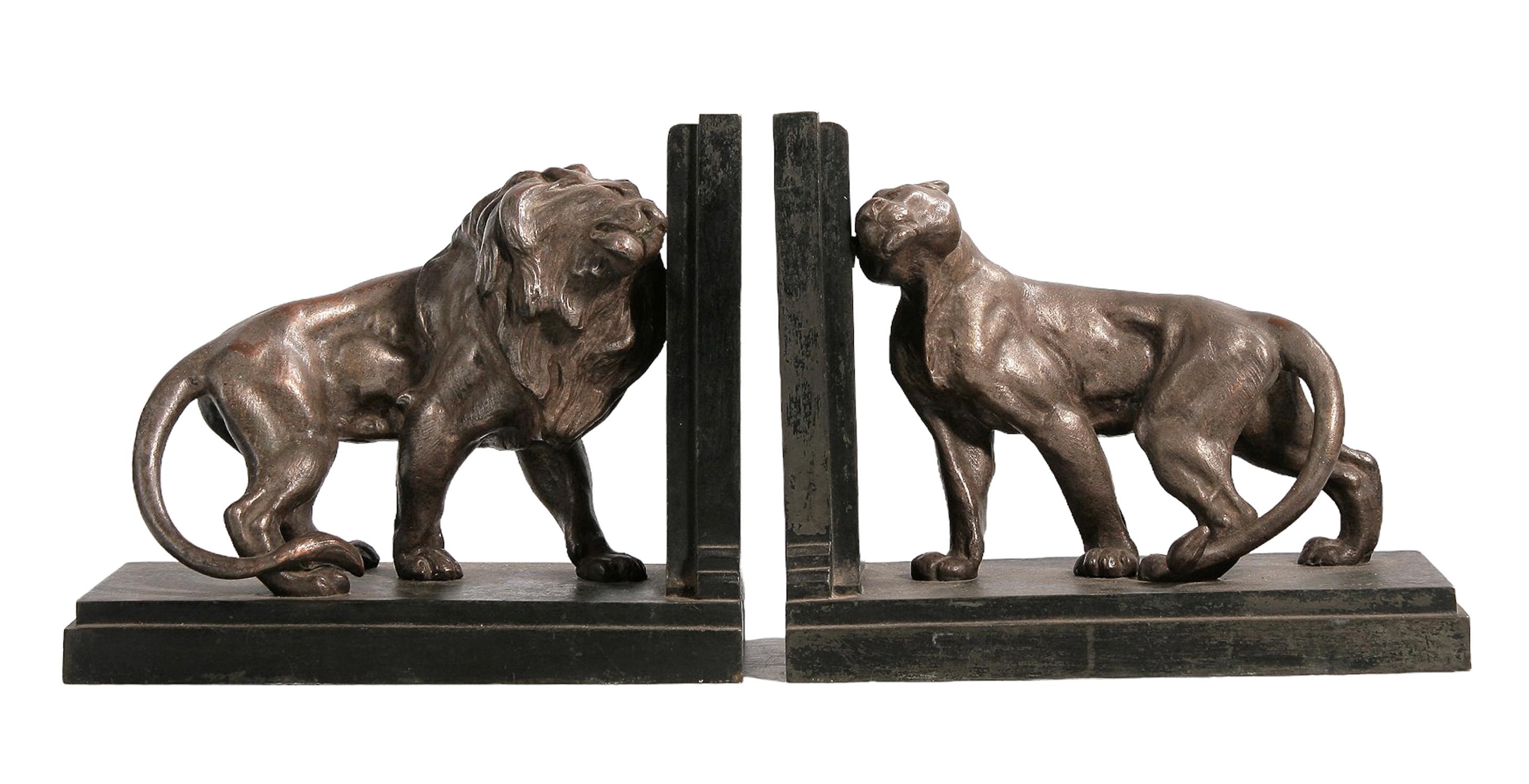 Pair of early 20th century Art Déco bronze and marble lions couple bookends by Émile Carlier, France

By: Émile Nestor Joseph Carlier
Material: stone, marble, metal, copper, bronze
Technique: patinated, cast, molded, polished, metalwork
Dimensions: