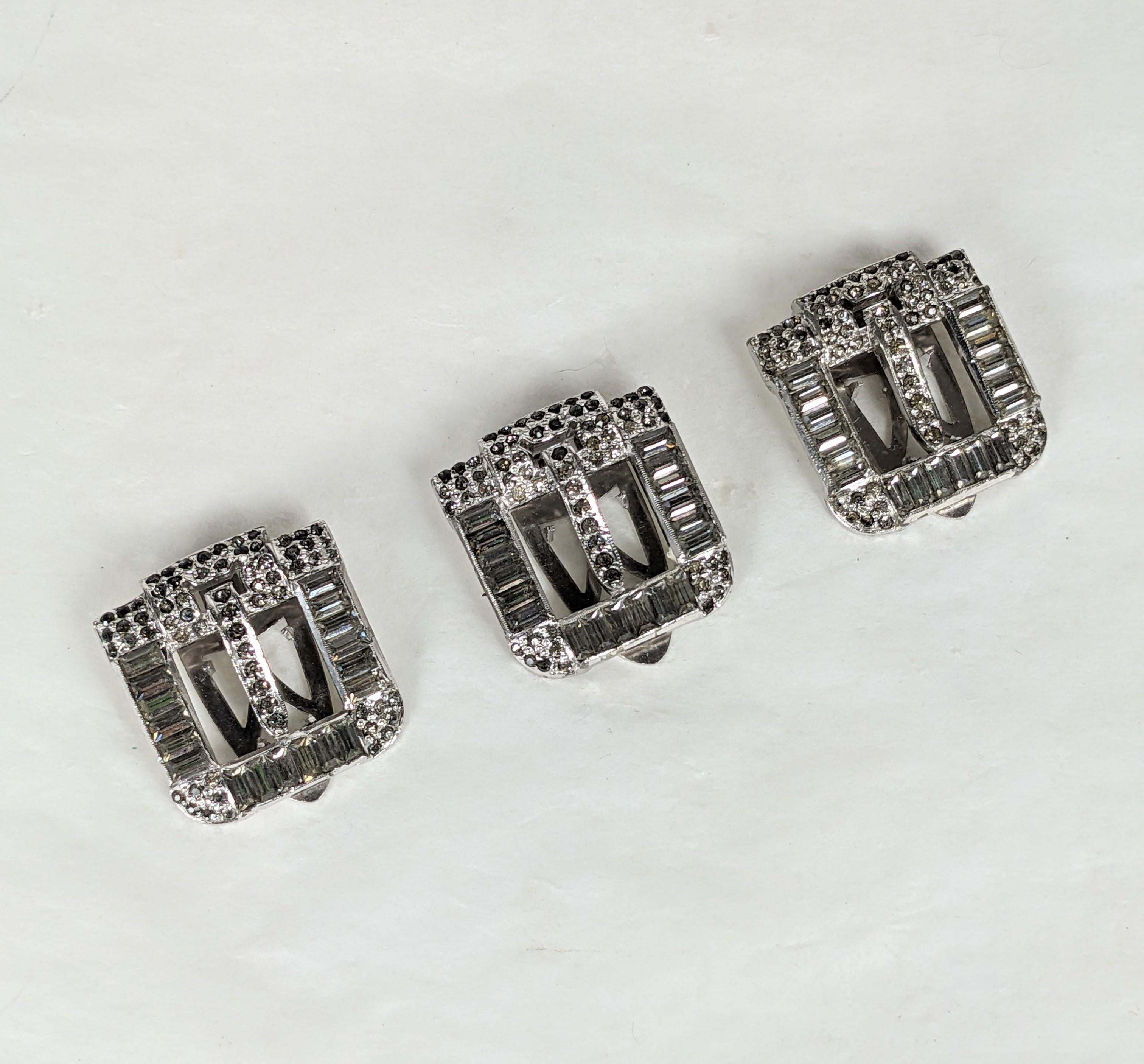 Elegant set of 3 Art Deco Buckle Clips from the 1920's. High quality early maker likely by Trifari. Open buckle design with baguette borders. 
Each 1