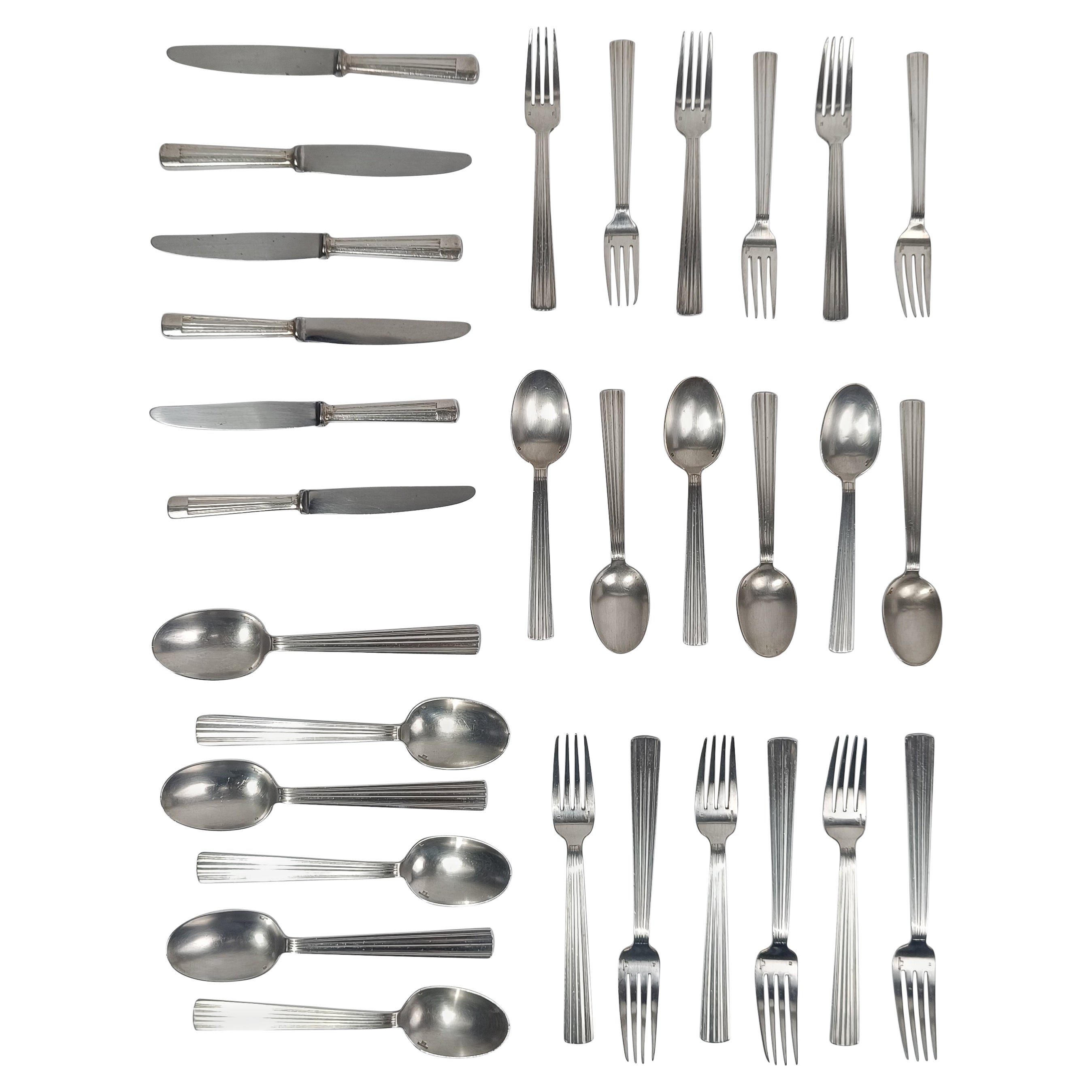 Ensemble de couverts Art Déco plaqués argent mode MIRA par LUC LANEL pour CHRISTOFLE en vente