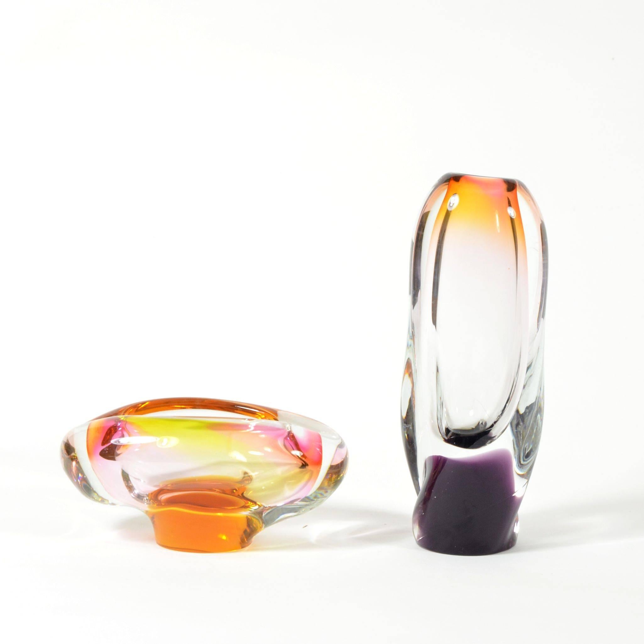 Set of ashtray and blown glass vase. Beautifully colored in orange, lila, yellow and pink colors. Without any damage, only with smaller uses. The height of the vase 20 cm. Made in Czechoslovakia during, 1960s.