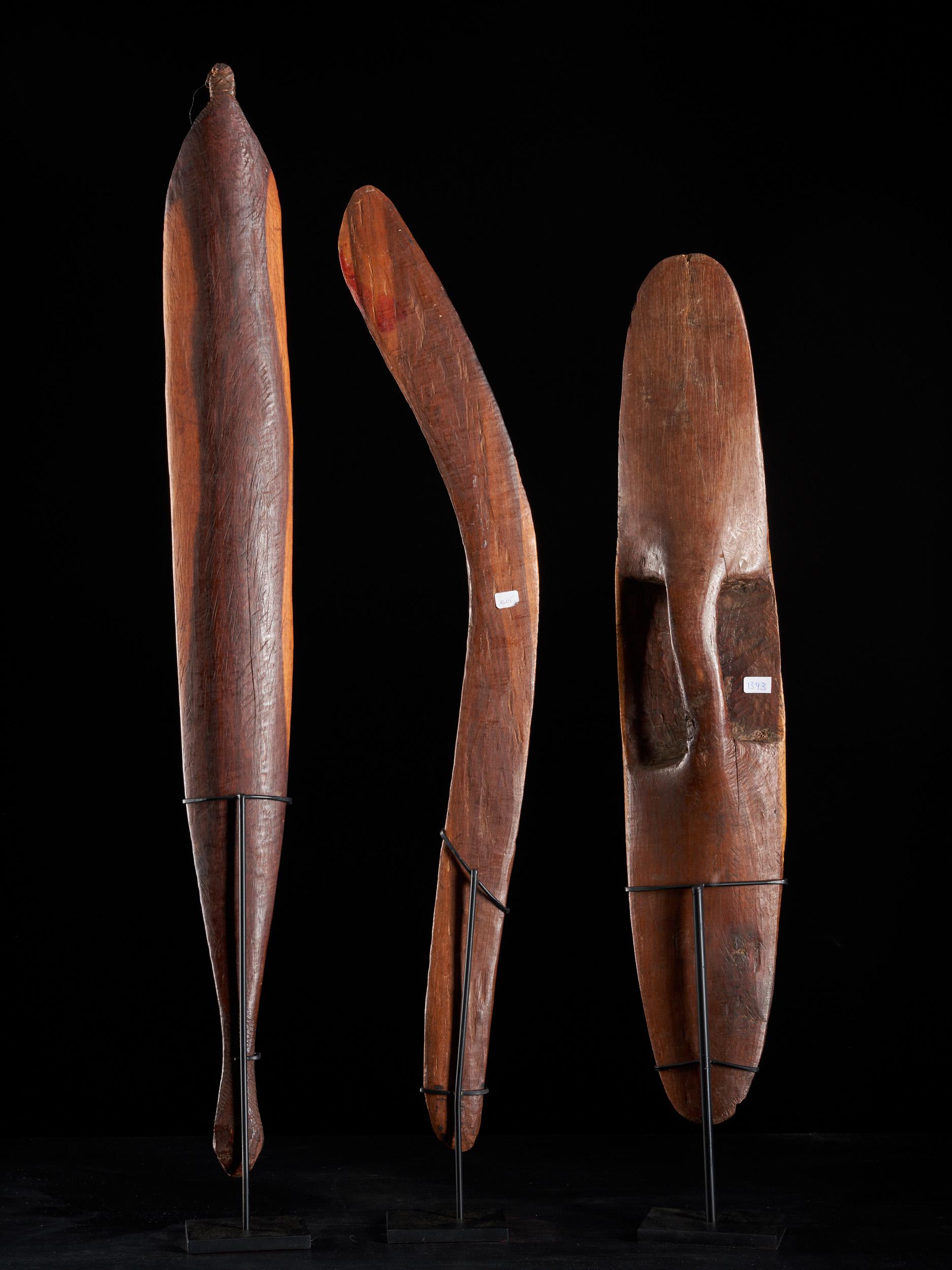 Set of Australian Aboriginal items with spear thrower, shield and boomerang.