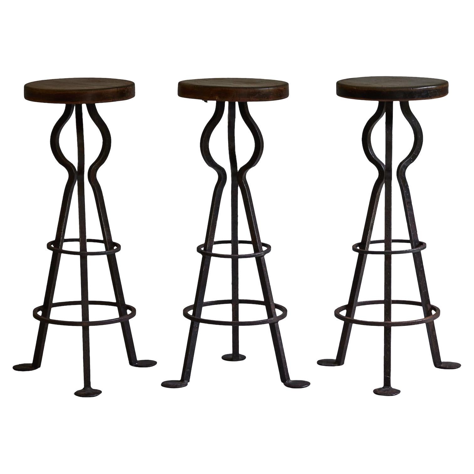 SET OF TWO BENTWOOD 1920'S BAR STOOLS WITH LINEN SEATS at 1stDibs
