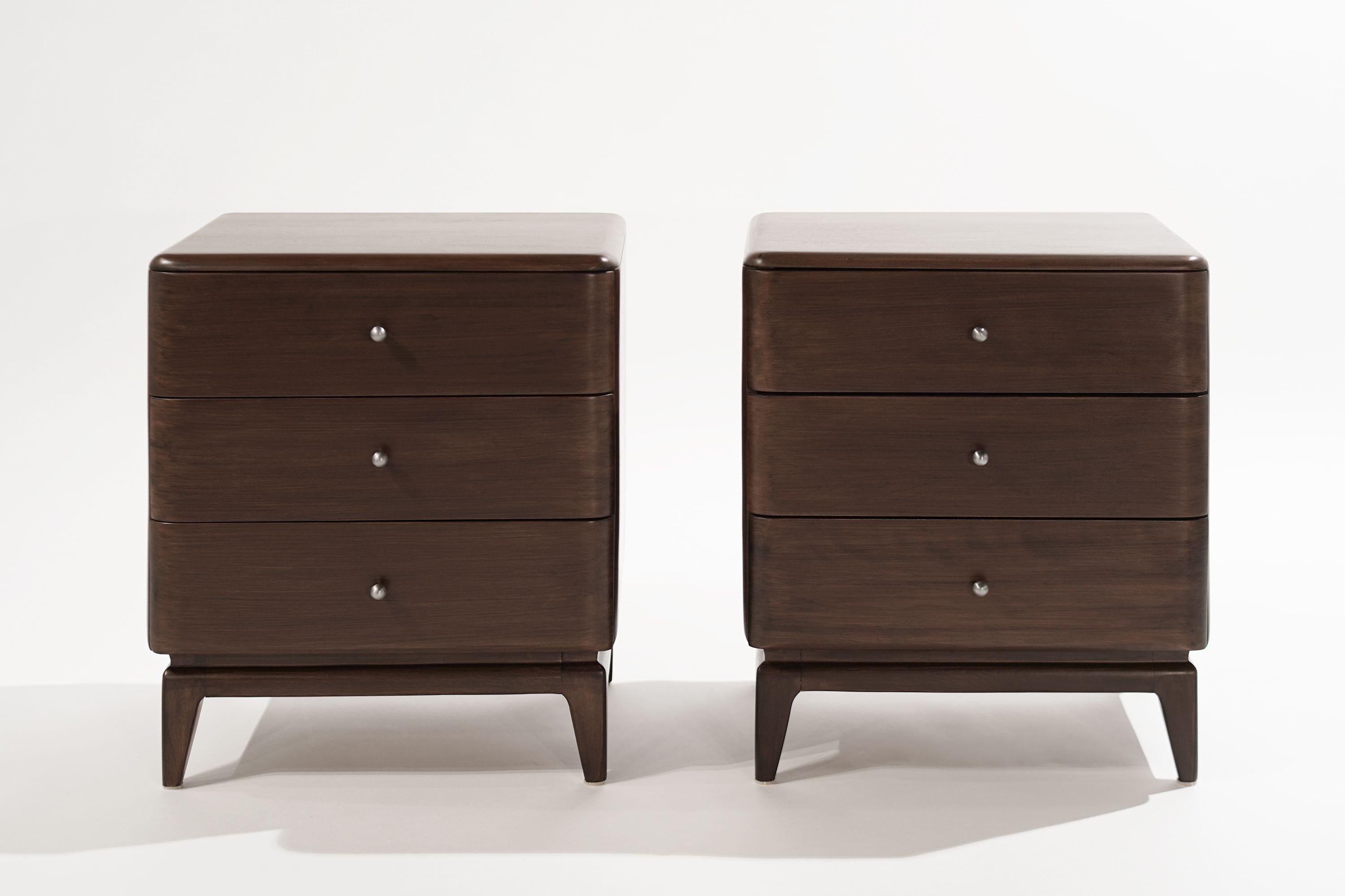 Set of end tables or nightstands executed in maple by Heywood Wakefield, circa 1950s. Featuring three drawers with polished steel pulls. Completely restored.

Other designers from this era include Jens Risom, Paul McCobb, George Nakashima, Tommi
