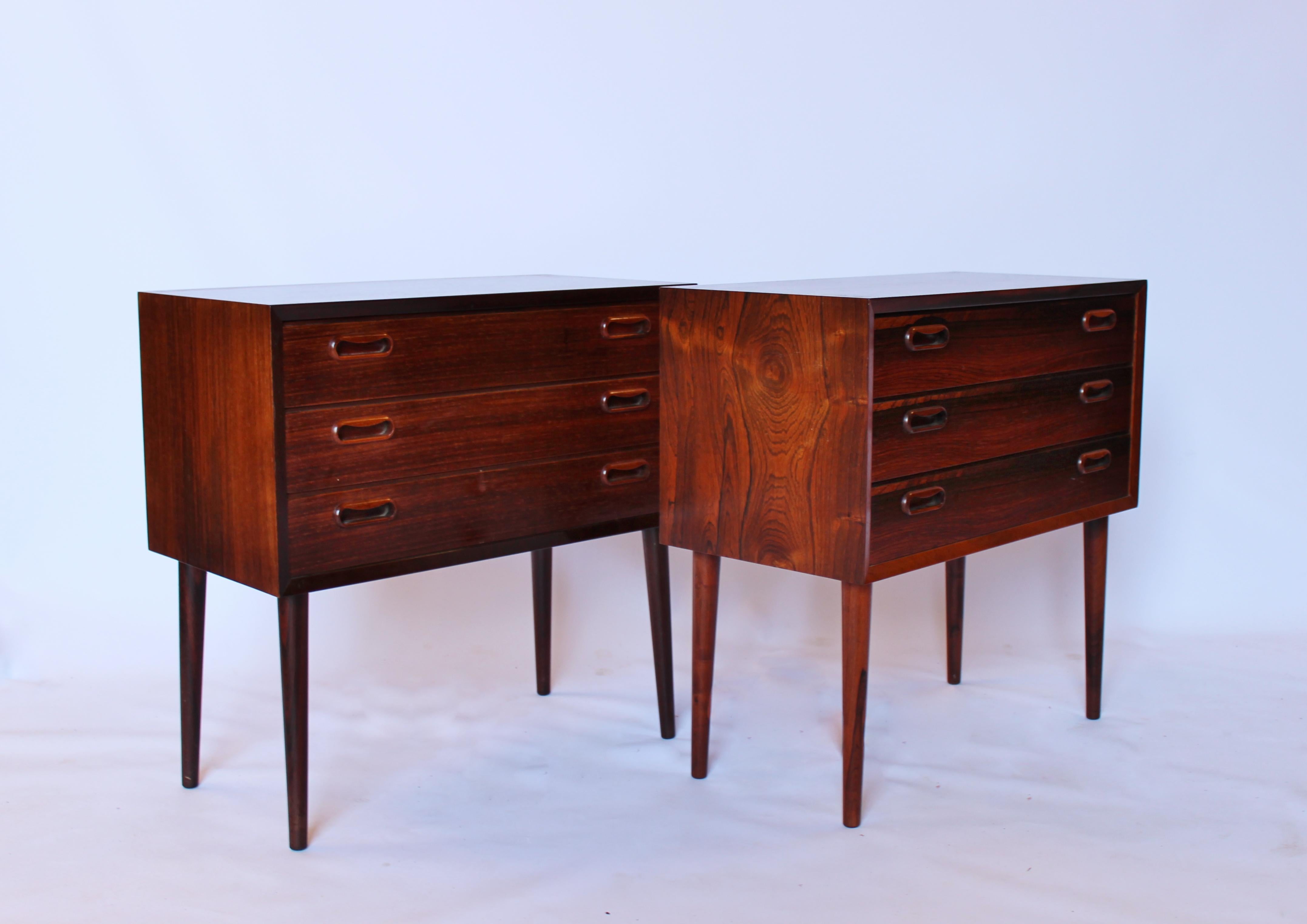 A set of bedside tables or chests in rosewood of Danish design from the 1960s. The chests are in great vintage condition.
