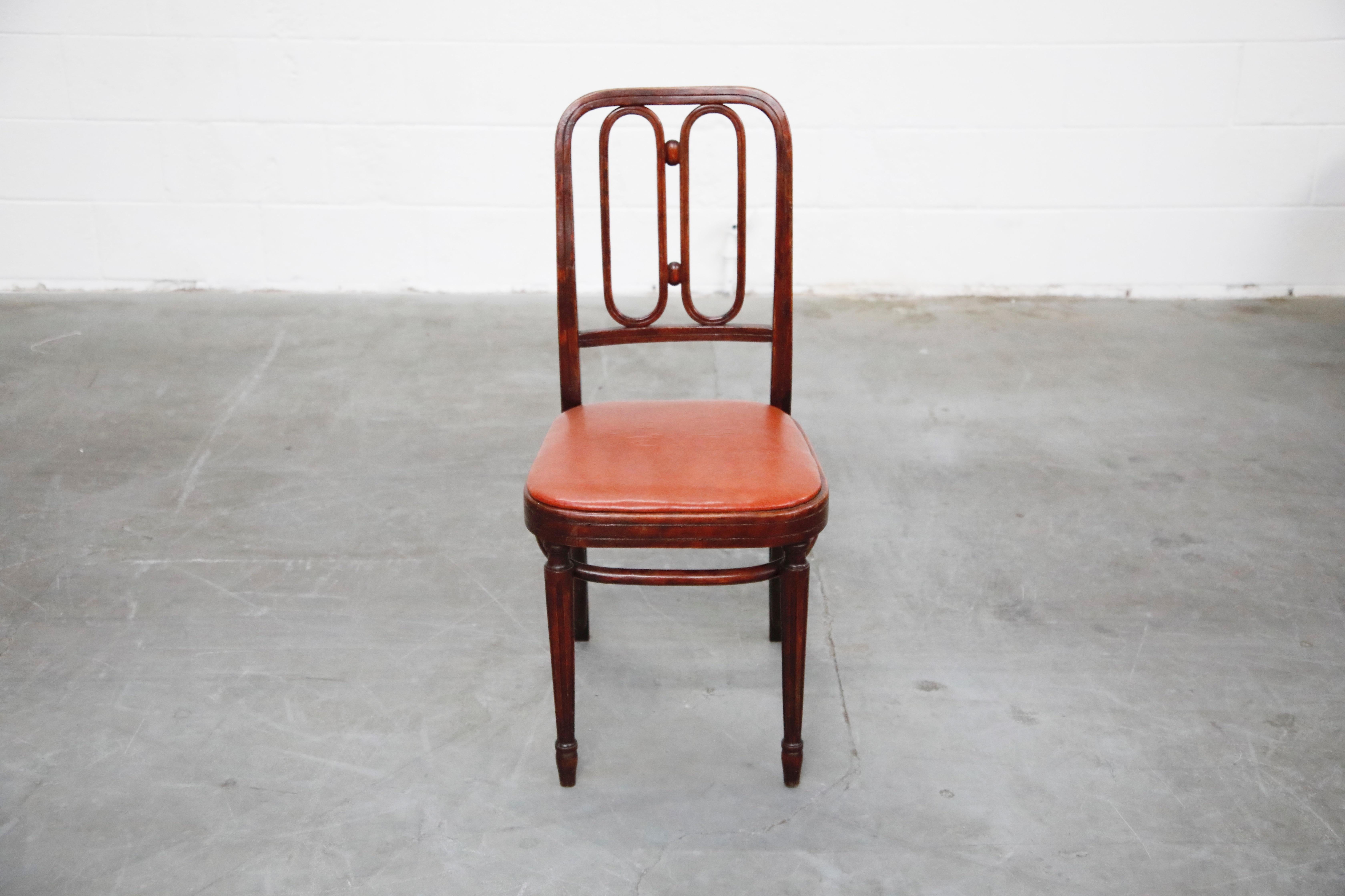 An amazing rare bentwood side chair by Josef Hoffmann for Thonet, circa 1920s, signed with Thonet label. This incredible authentic side chair features dark stained bentwood and burgundy seat by the famous Thonet furniture company first started by
