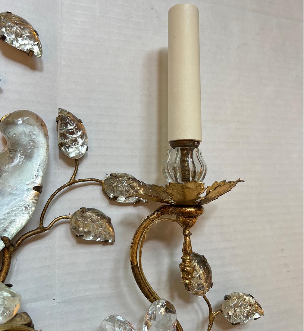 Set of 4 1950's French gilt metal sconces with molded glass birds and foliage. Sold in Pairs.

Measurements:
Height: 24.75