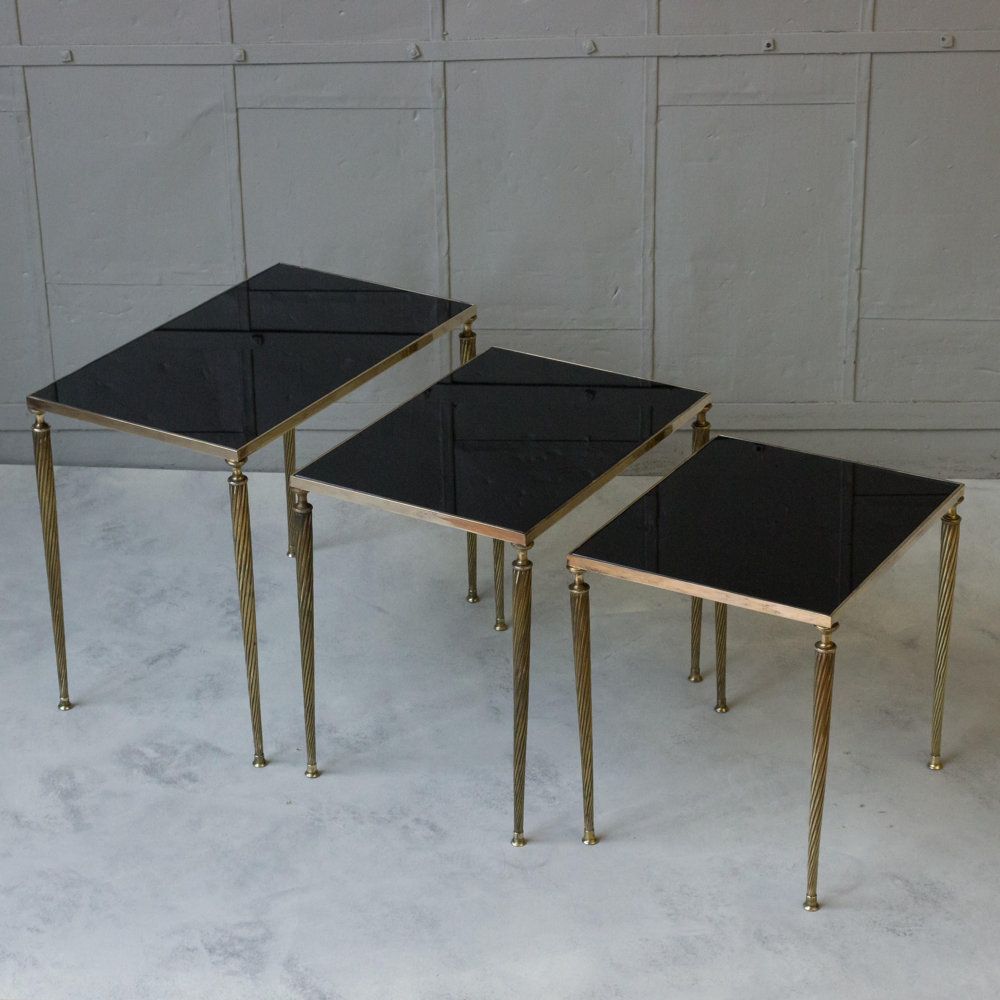 Neoclassical Revival  Set of 3 French Black Glass and Brass Nesting Tables   For Sale