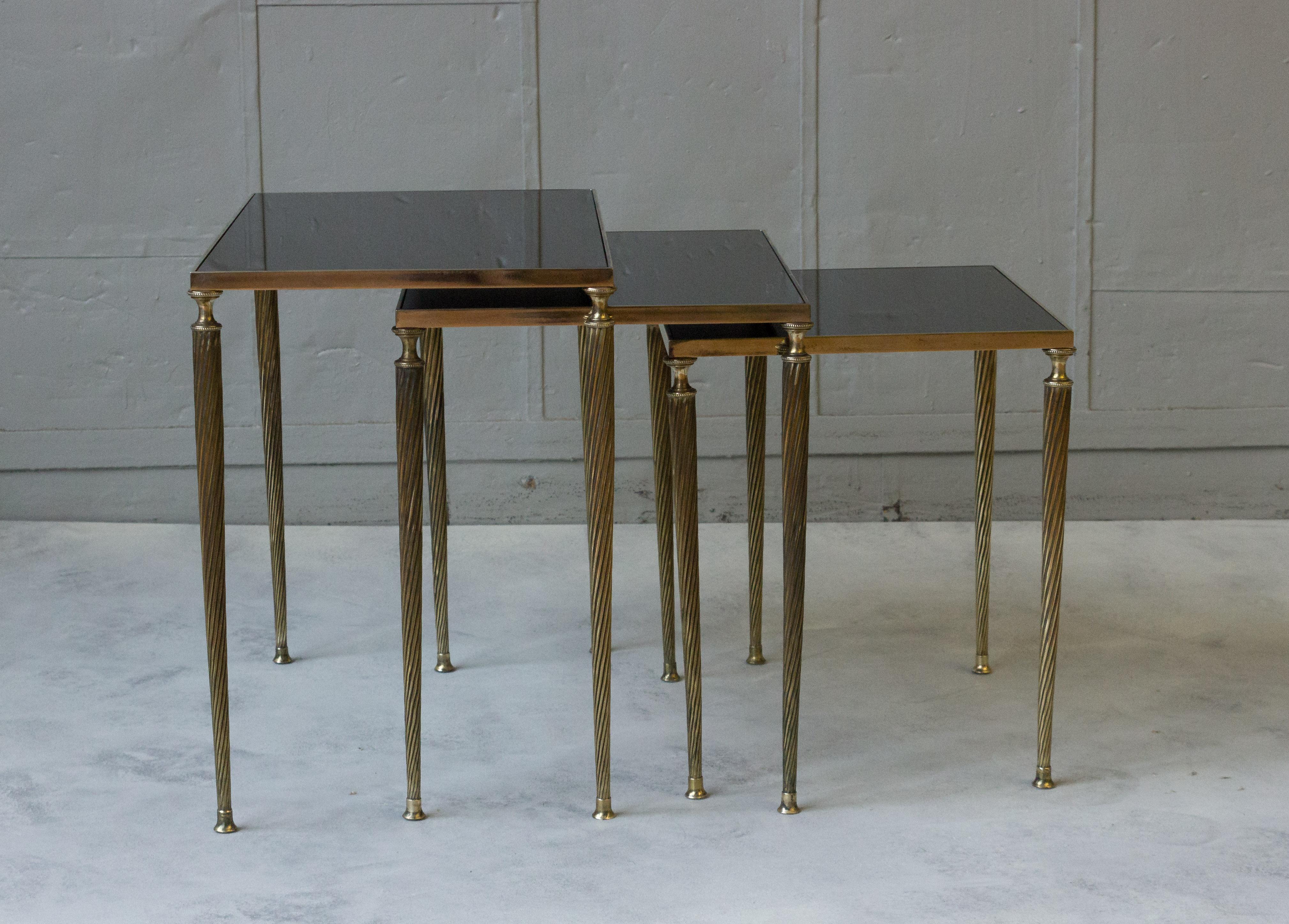 Mid-20th Century  Set of 3 French Black Glass and Brass Nesting Tables   For Sale