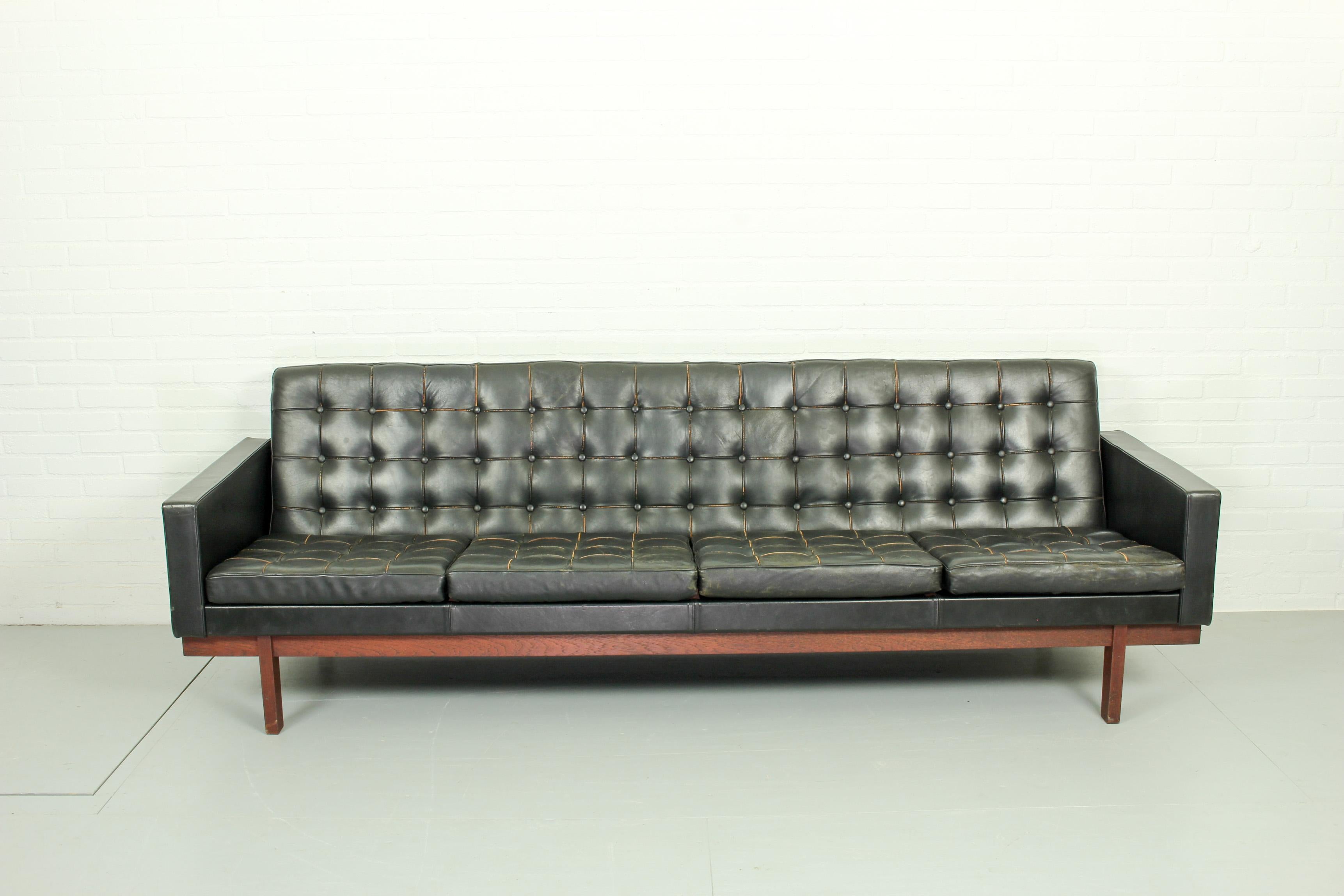 A very very rare complete set of black leather 4-*seat sofa and 2 matching lounge chairs by Karl Erik Ekselius circa 1960. Sofas by Ekselius, a Swedish designer, are rare to the market. Produced by JOC in Sweden. This set certainly has patina and