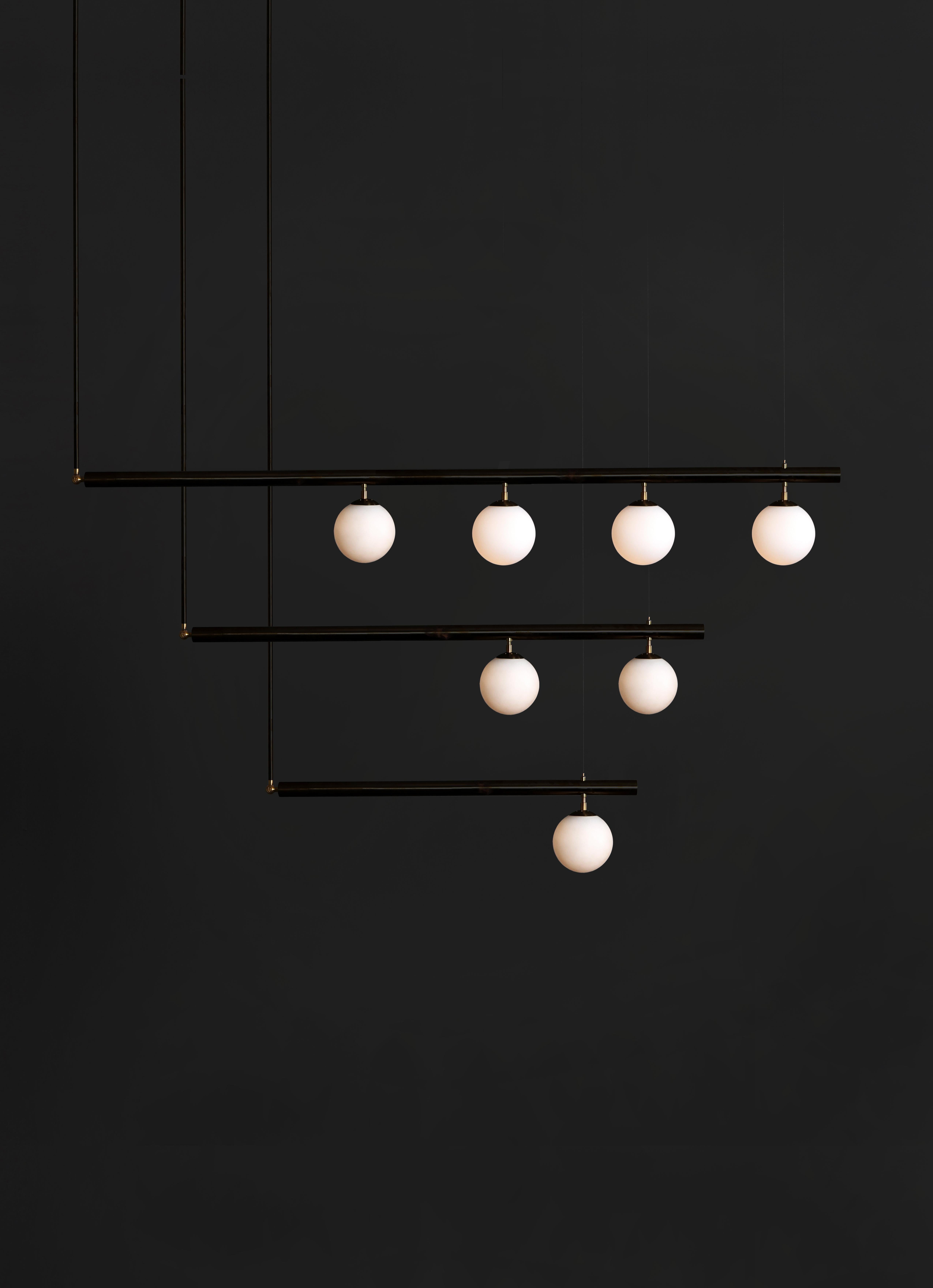 Set of black satellite I II IV sculpted pendant by Paul Matter
Blackened brass with brushed brass details
Dimensions: 182 x 89 x 15.2 cm
182 x 129 x 15.2 cm
182 x 180 x 15.2 cm
 
Satellite is inspired by the conceptual and Minimalist movement of the
