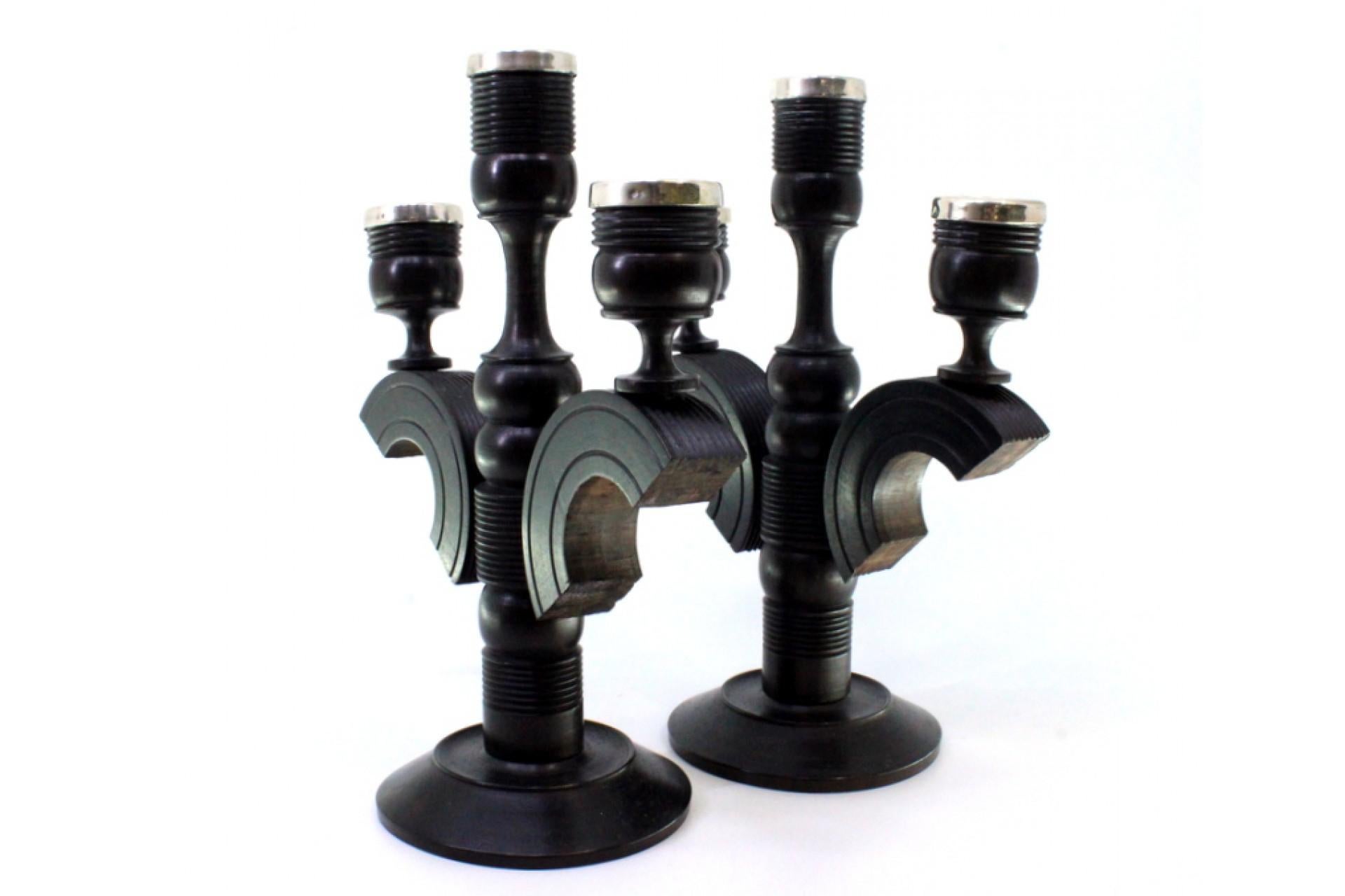 20th Century Set of black wood candelabras with silver applications on the shafts For Sale