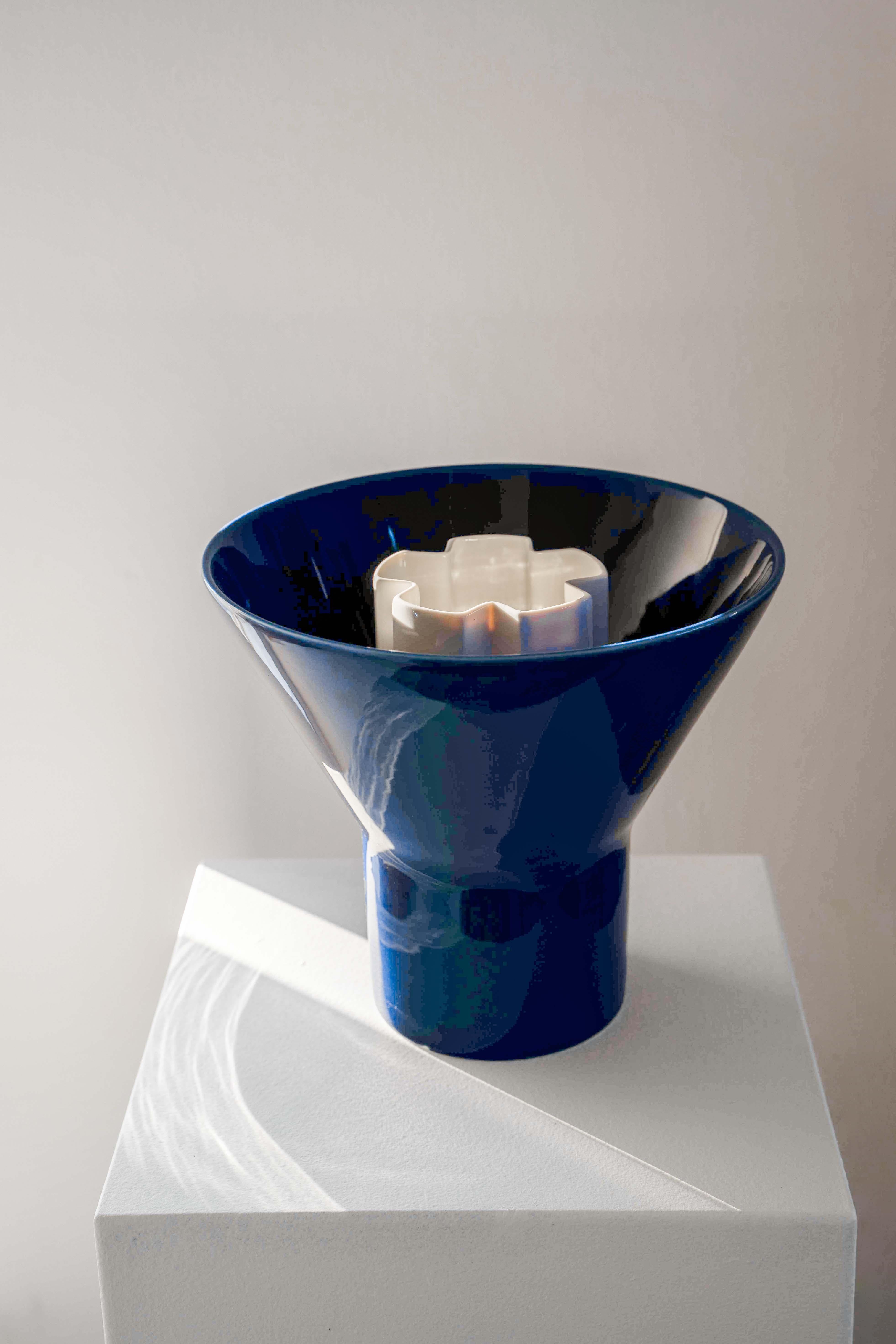 Set of blue ceramic large KYO vase and white large Kyo vase star by Mazo Design
Dimensions: D 29 x H 26 cm / D 12 x H 23.5 cm
Materials: glazed ceramic.

Both functional and sculptural, the new collection from mazo is very Scandinavian and