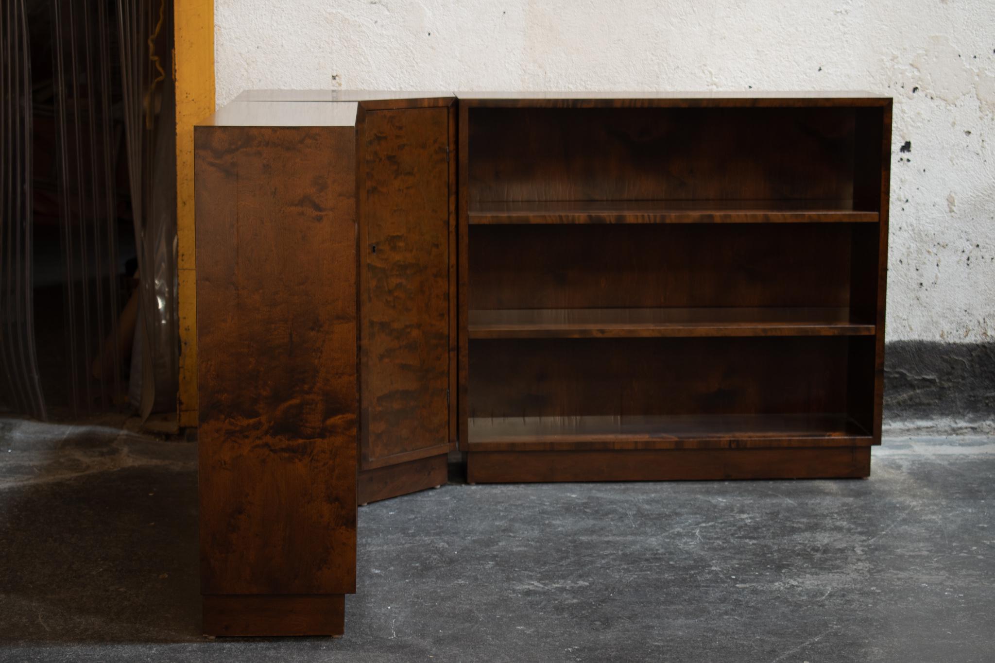Set of Art Deco bookcases and corner cabinet in beautiful flame birch. These are three separate pieces, and the bookshelves are identical in size. They each have two adjustable shelves and are finished on the sides. The corner cupboard has two