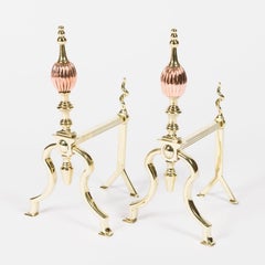 Set of brass and copper fire dogs with matching fire tools