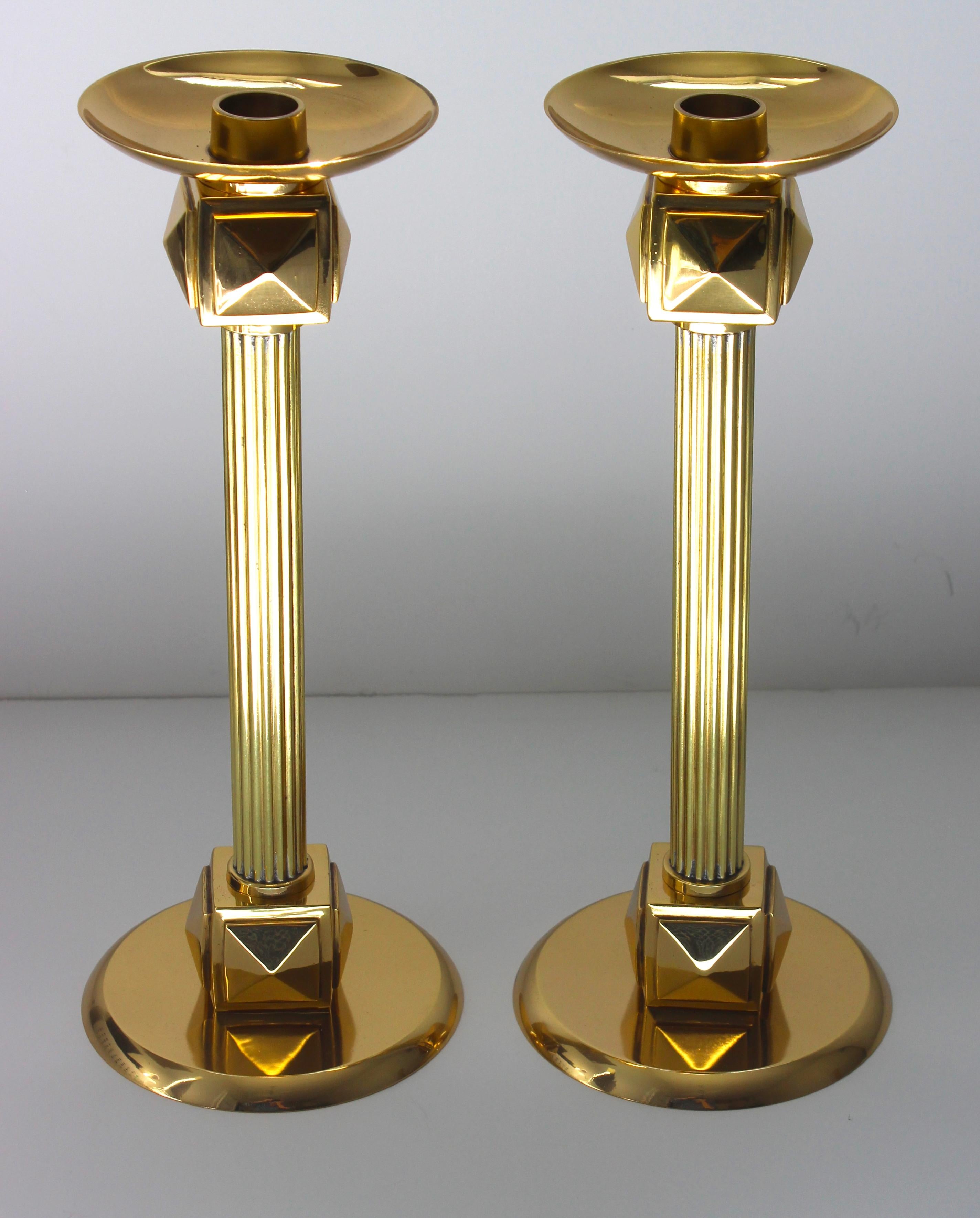 This stylish Art Deco style candlesticks date to the late 1970s-1980s and were designed by the American interior designer Larry Laslo.

Note: These have been professionally polished and finished with a clear lacquer, so no tarnishing.

 