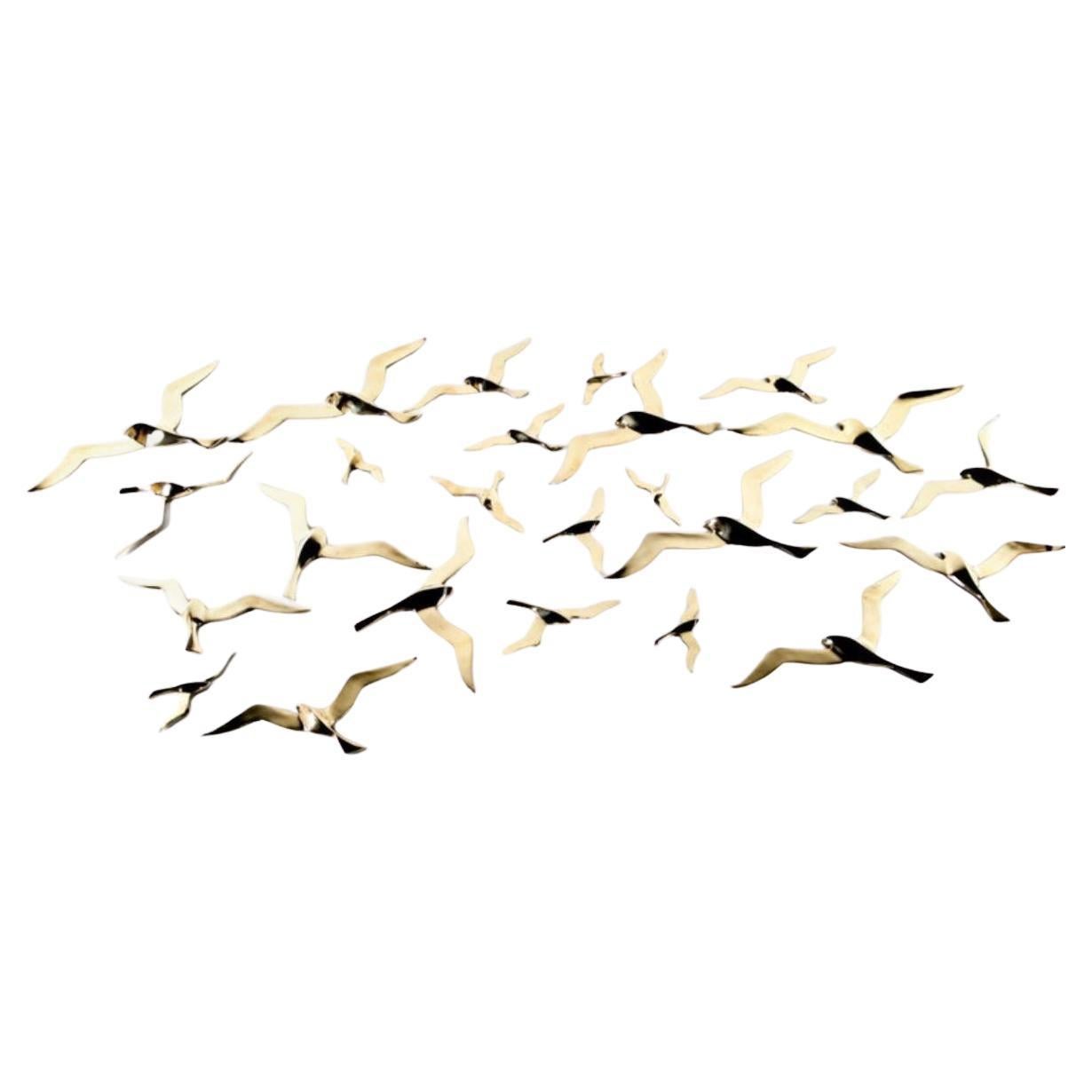 Set of brass birds wall sculptures