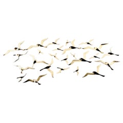 Set of brass birds wall sculptures