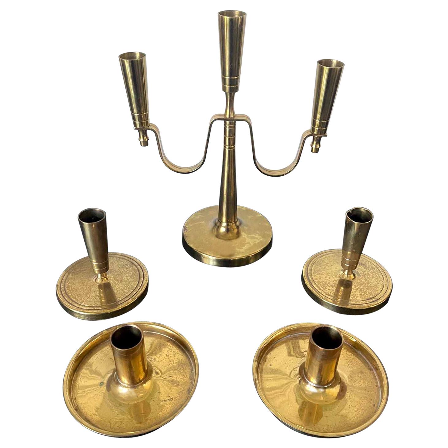 Set of Brass Candelabra and Candlesticks Tommi Parzinger For Sale