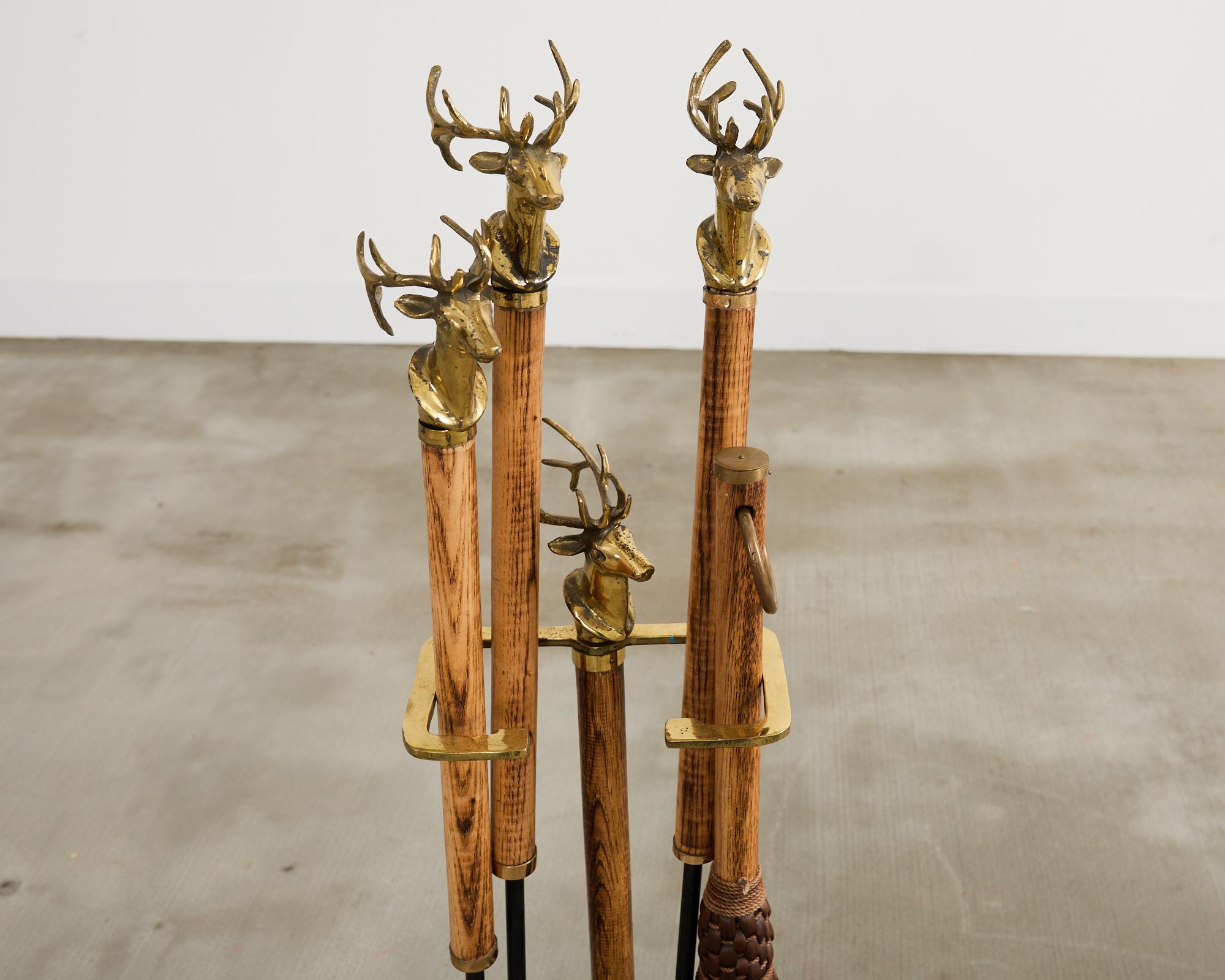 Country Set of Brass Iron and Oak Deer Head Fireplace Tools