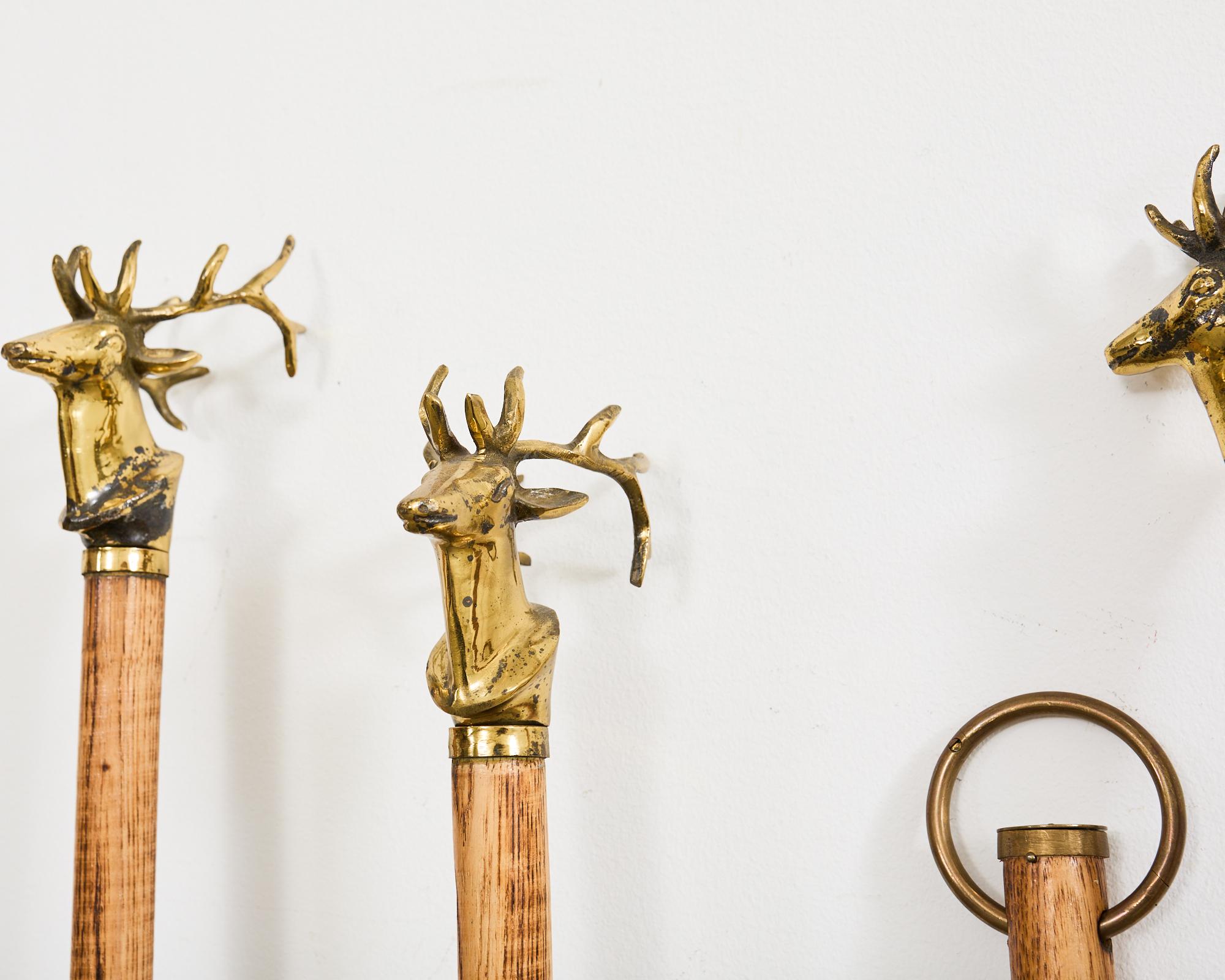 Patinated Set of Brass Iron and Oak Deer Head Fireplace Tools