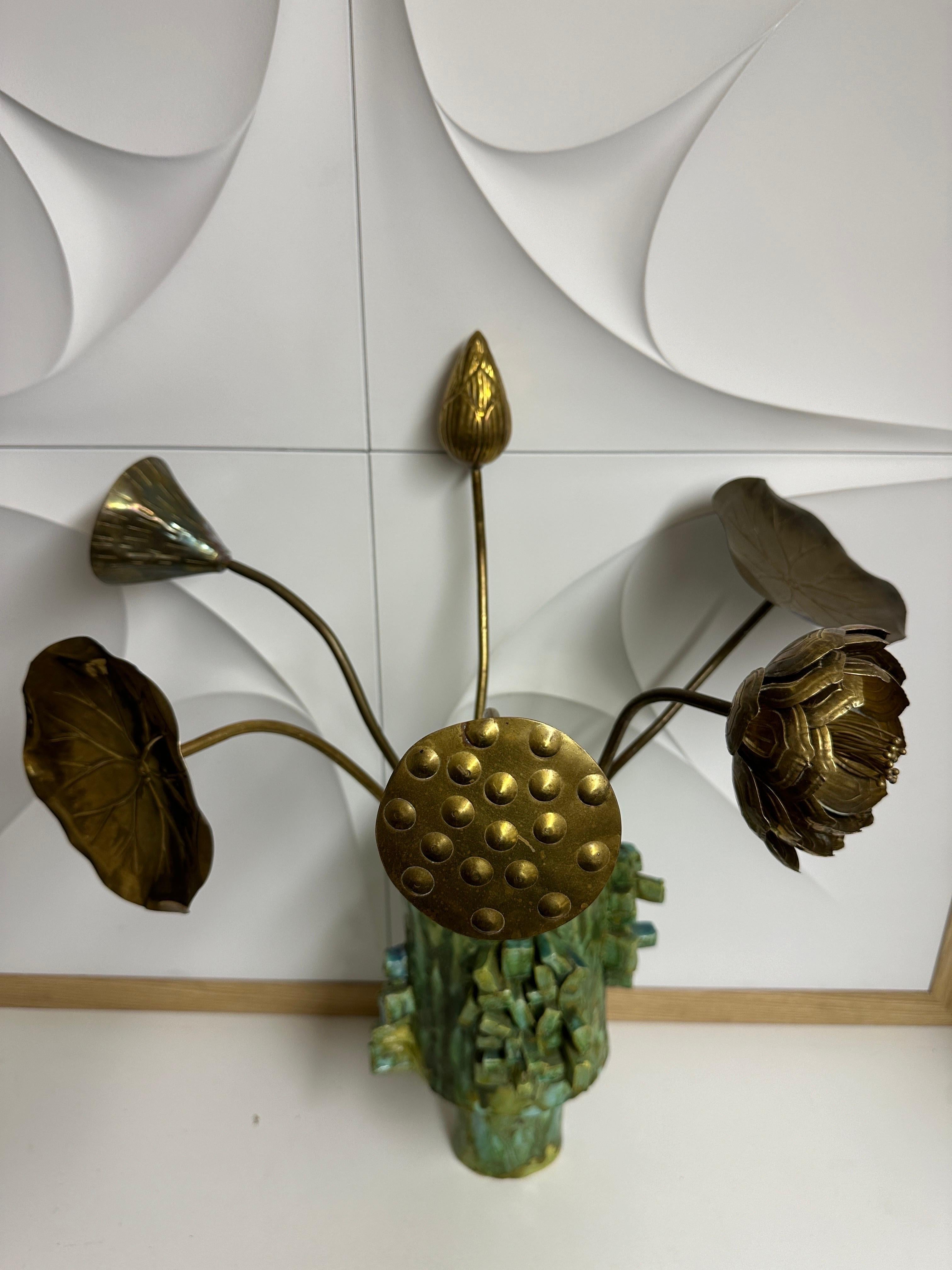 Set of six brass lotus flowers attributed to Feldman.
Ceramic pot is not included.
Flowers range from 19”-21” high. Lotus leaves are 6” diameter.