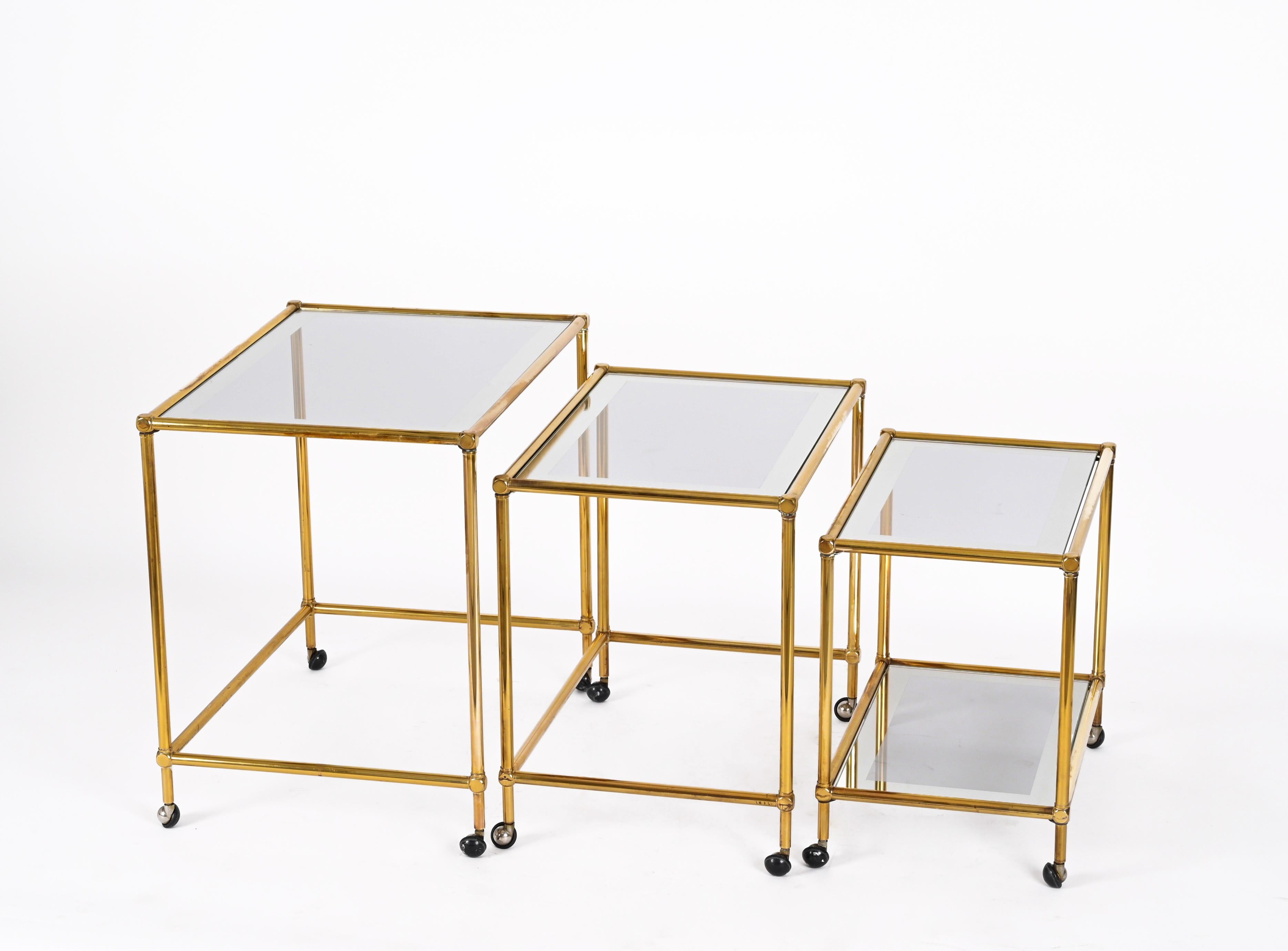 Mid-Century Modern Set of Brass Mirrored Border with Glass Top Nesting Tables, Maison Jansen, 1970s For Sale