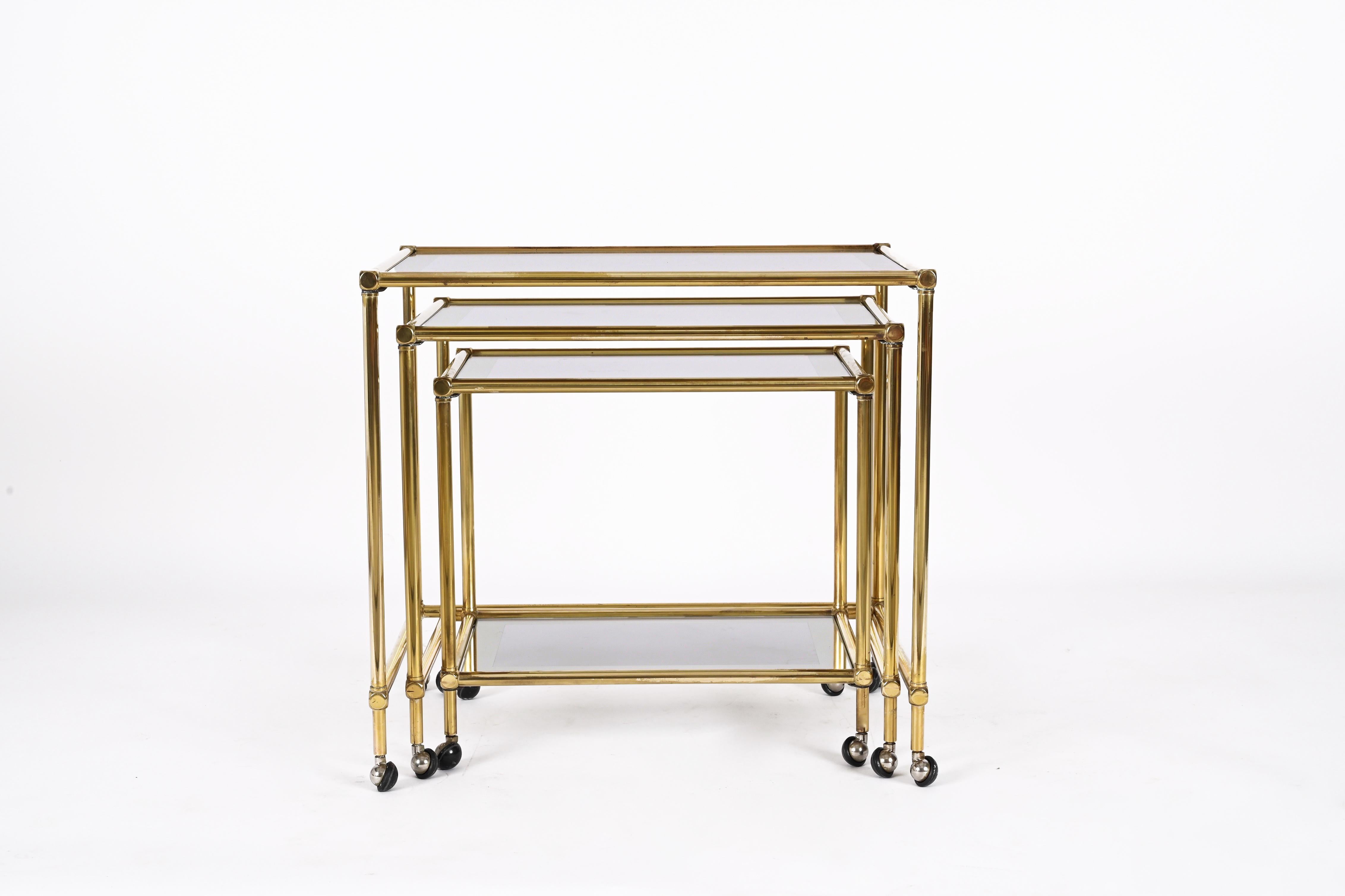 Late 20th Century Set of Brass Mirrored Border with Glass Top Nesting Tables, Maison Jansen, 1970s For Sale