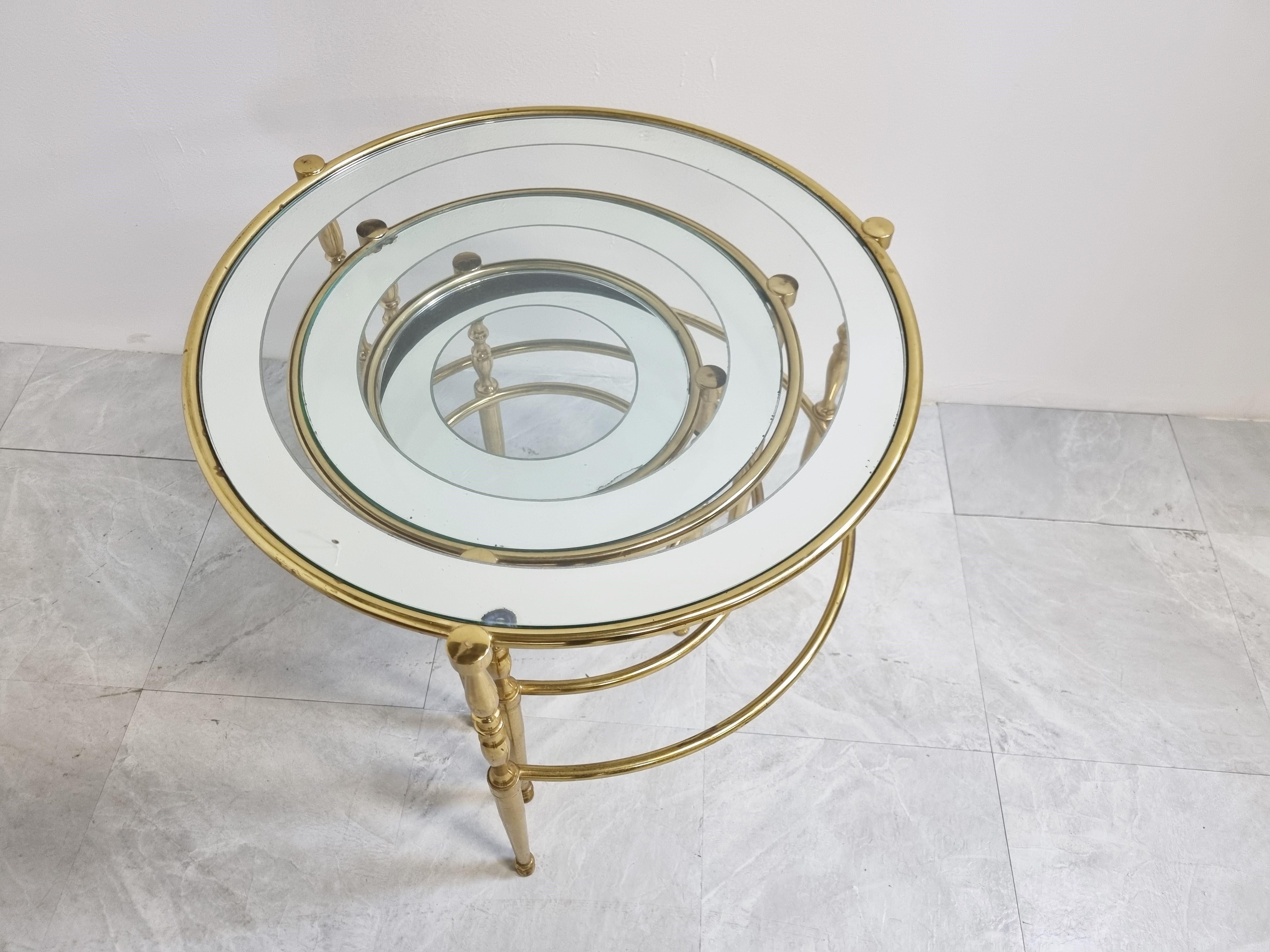 Very elegant set brass neoclassical round nesting tables

The tables come with their original clear and mirror glass tops

1970s - France

Dimensions of the largest table:
Height: 50cm/19.68